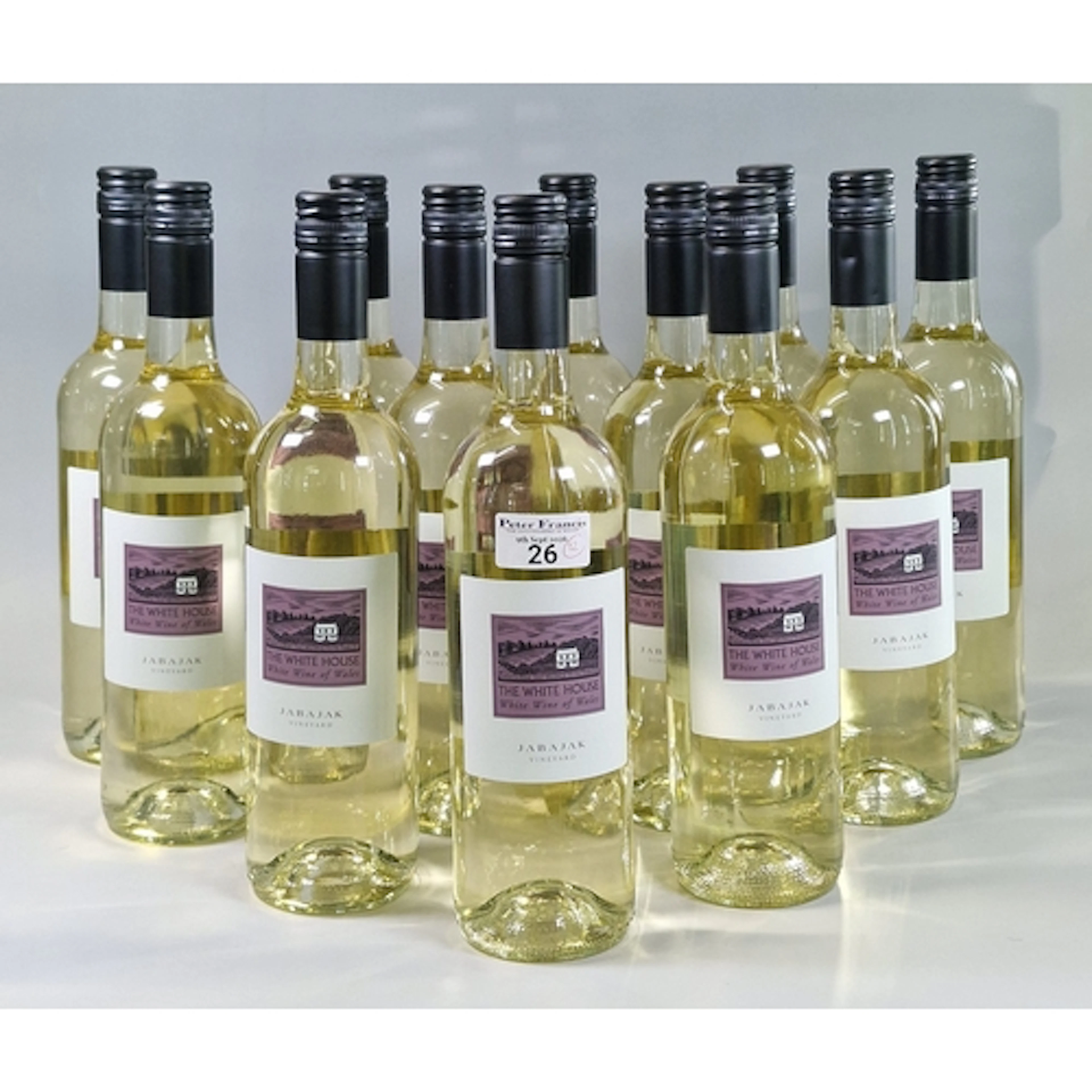 Twelve bottles of White House White Wine of Wales, produced ...