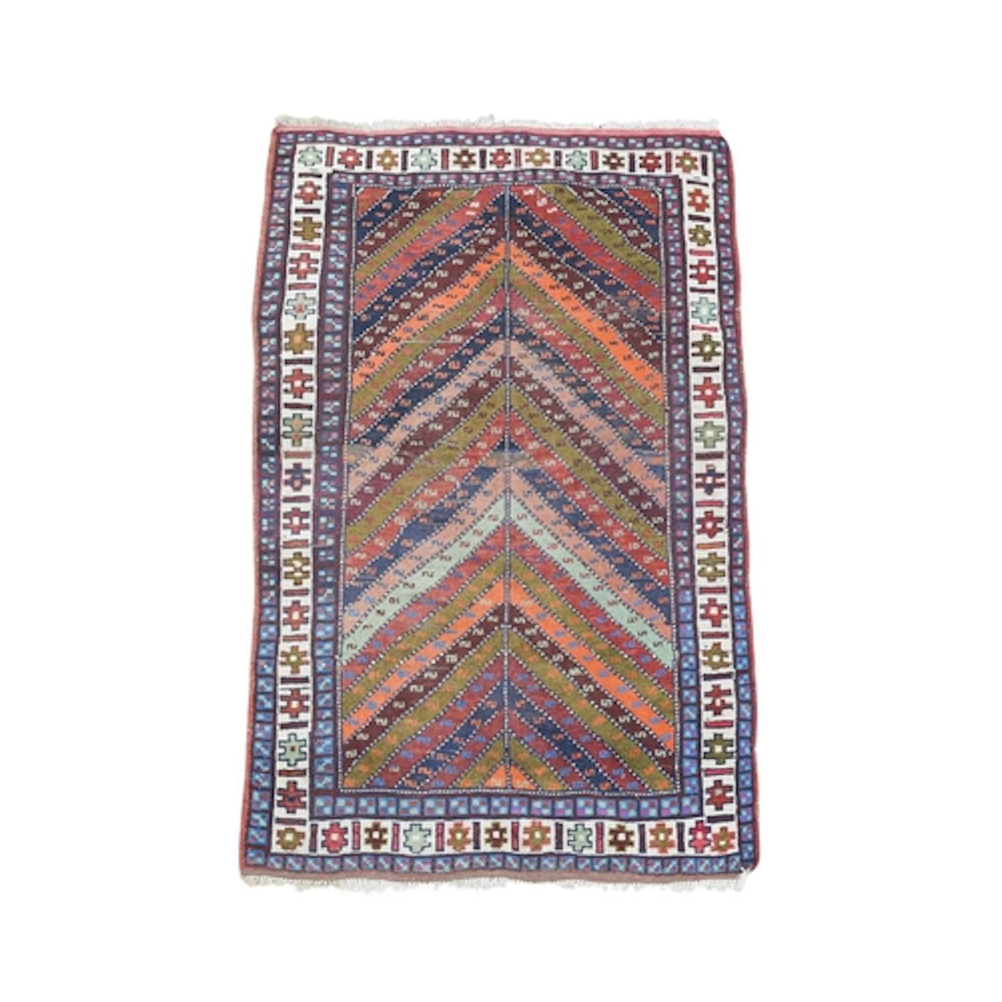 A Kurdish rug, mid-late 20th century. With rows of polychrom...