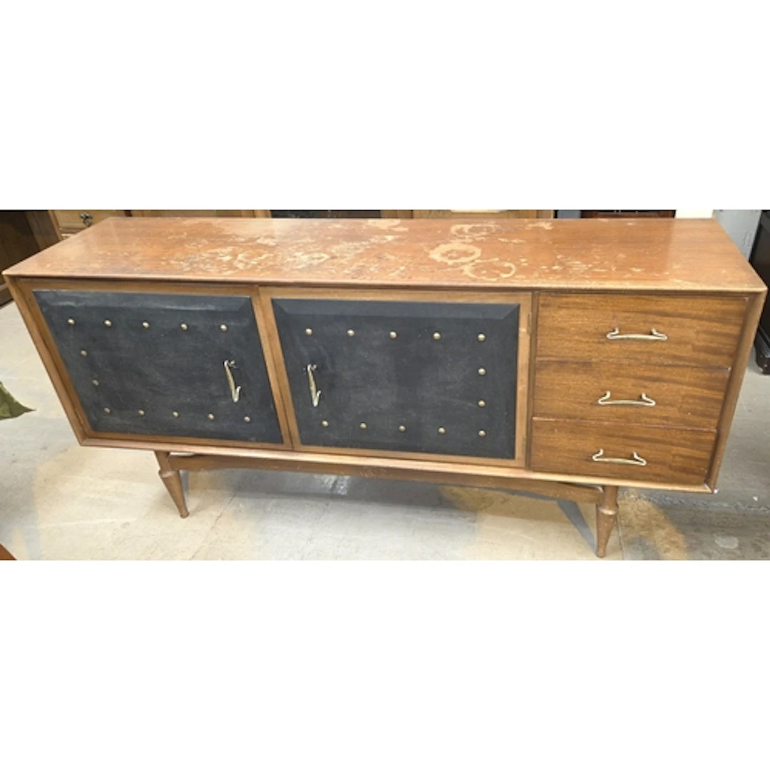 An unusual mid-century teak long John sideboard with two cup...