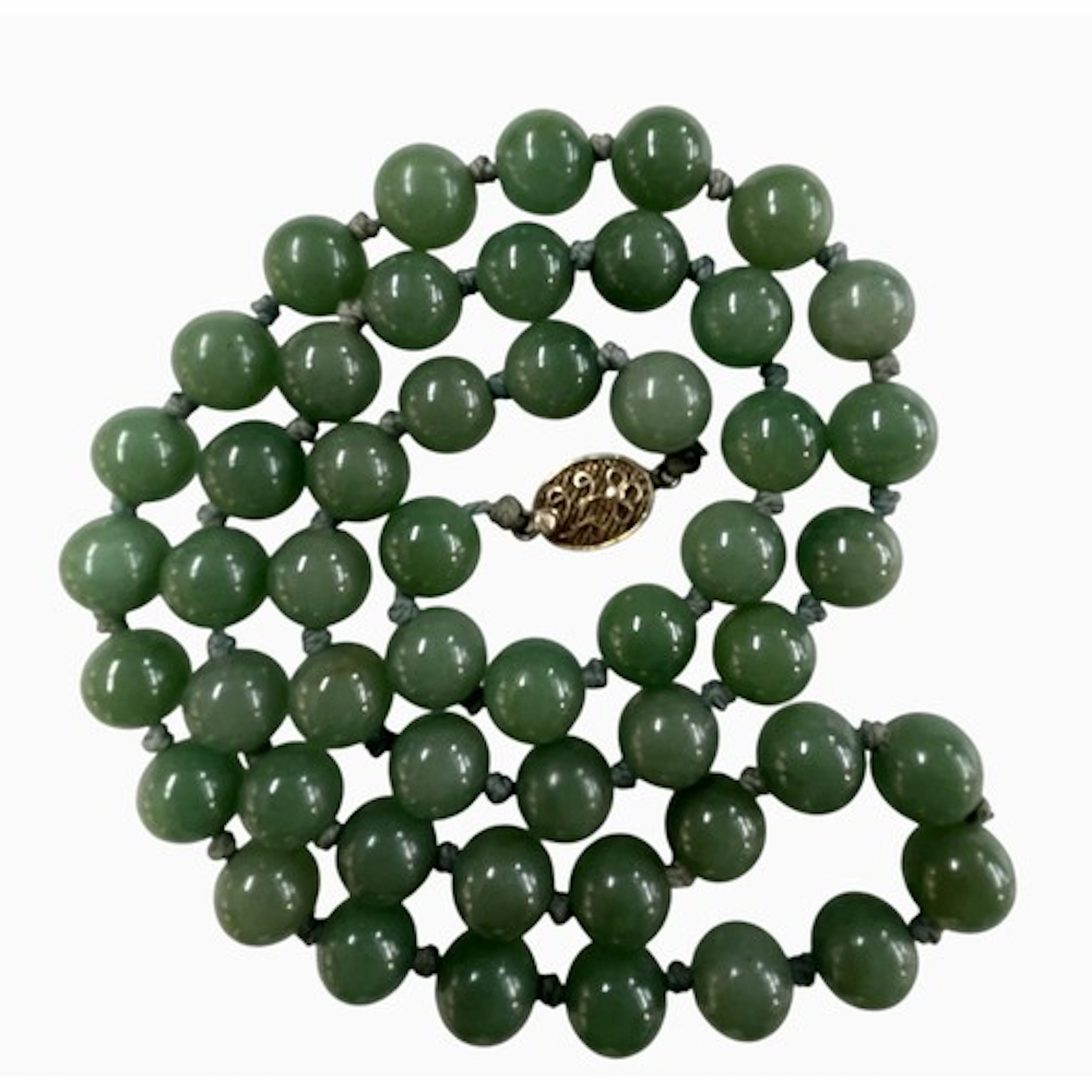 Chinese export jade bead necklace with a silver gilt filigre...