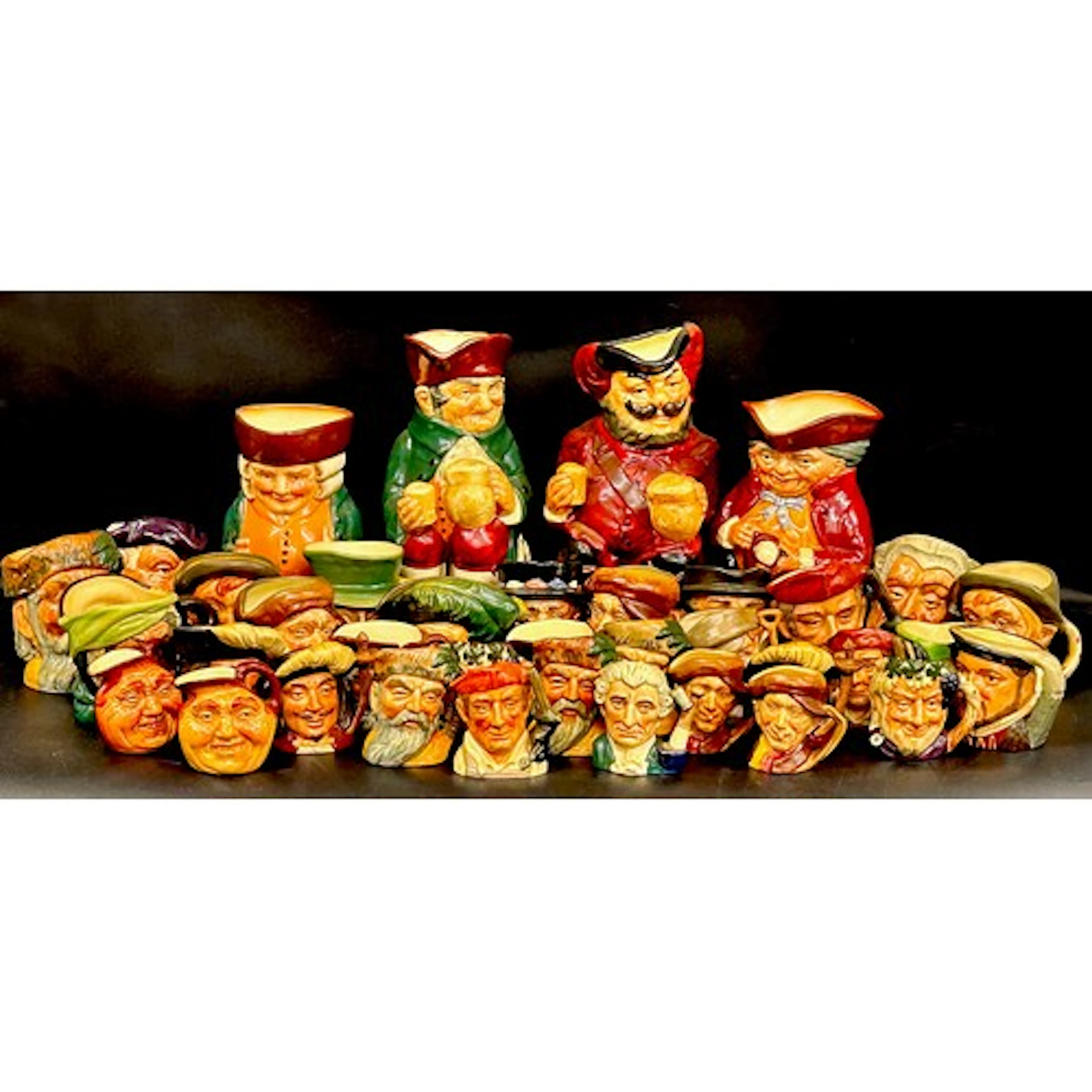 A collection of small/miniature Royal Doulton character jugs...