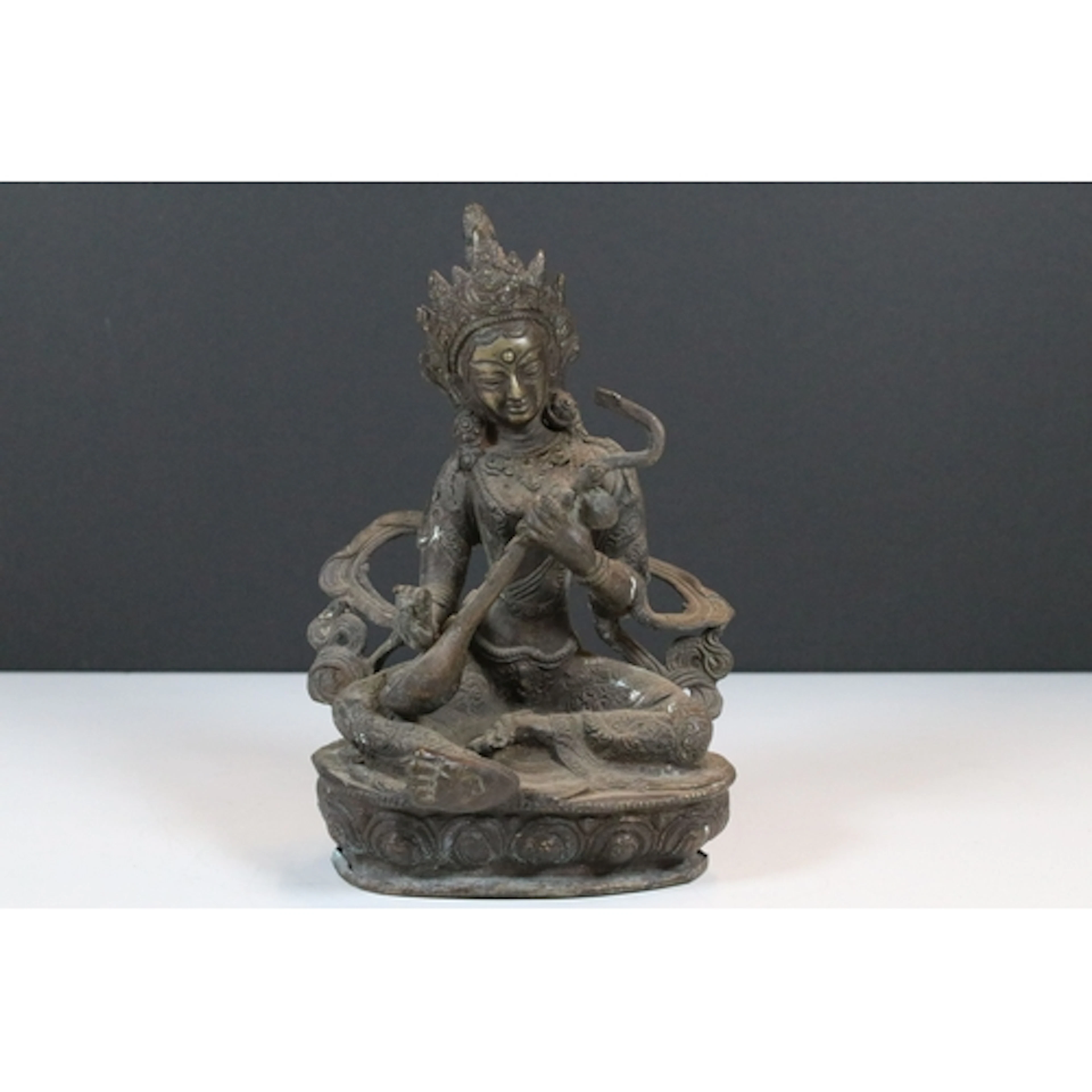 Antique cast bronze figure of a Kinnara, probably Tibetan. M...