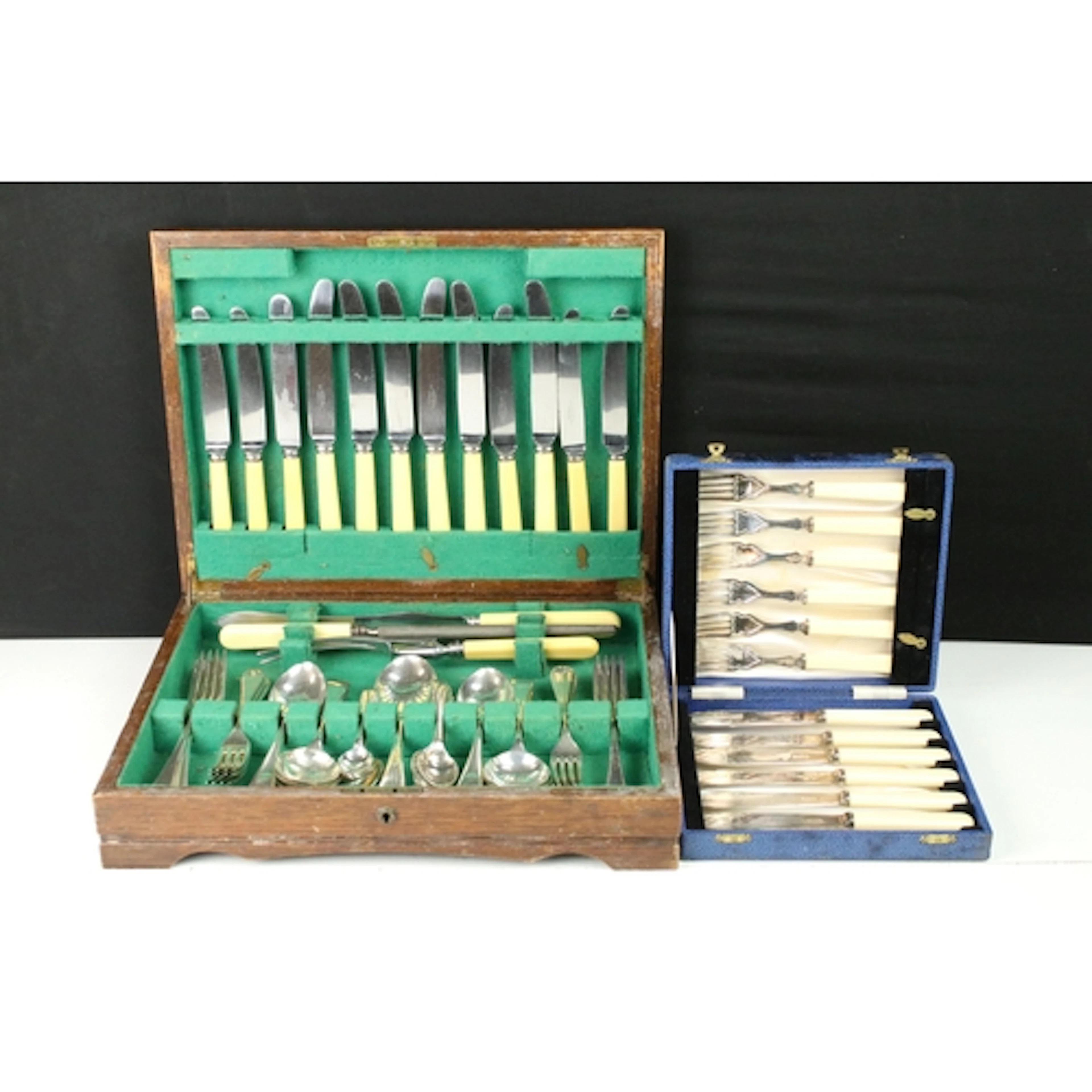 Wooden cased canteen of silver plated cutlery together with ...
