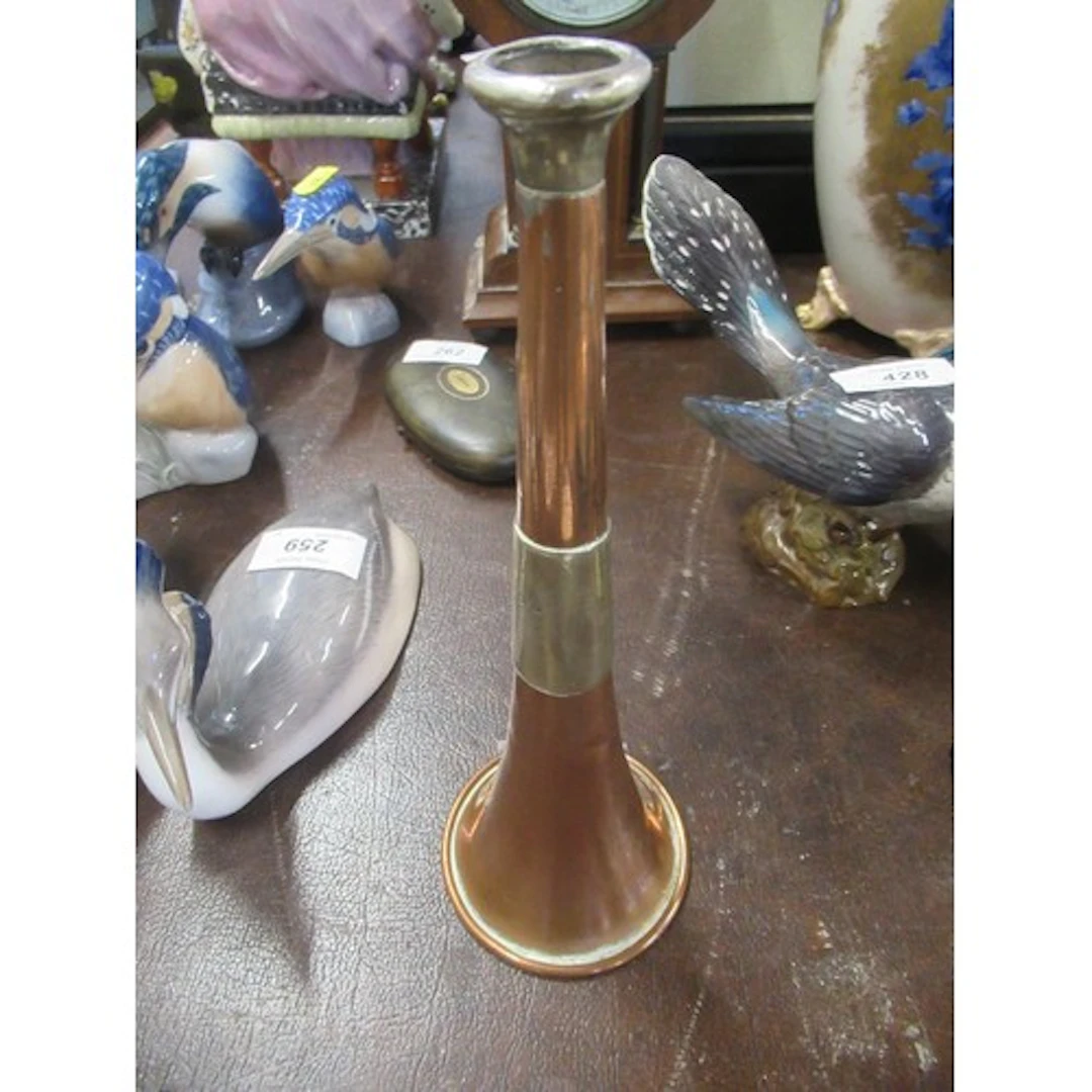 A 19th century hunting horn, with silver mount