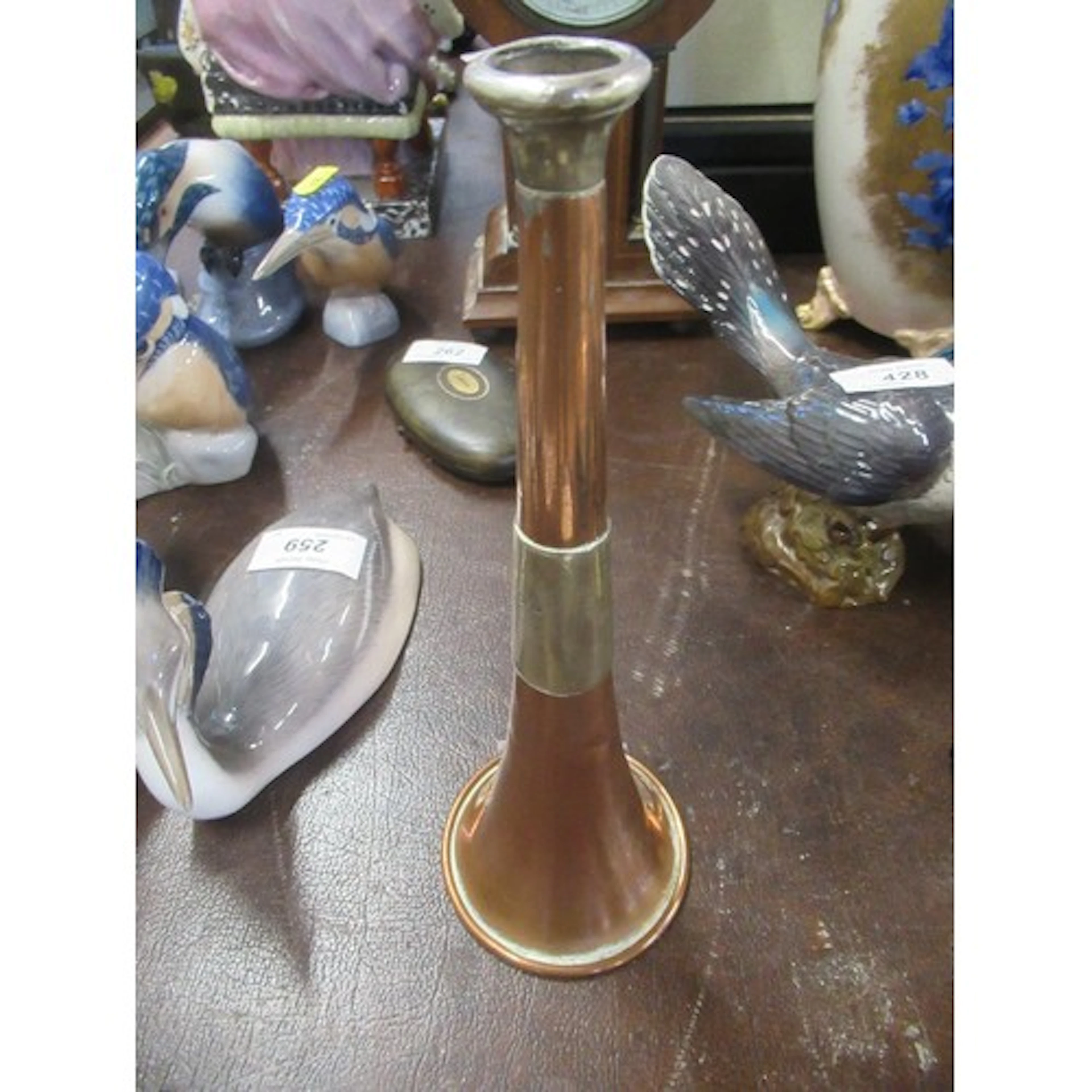 A 19th century hunting horn, with silver mount