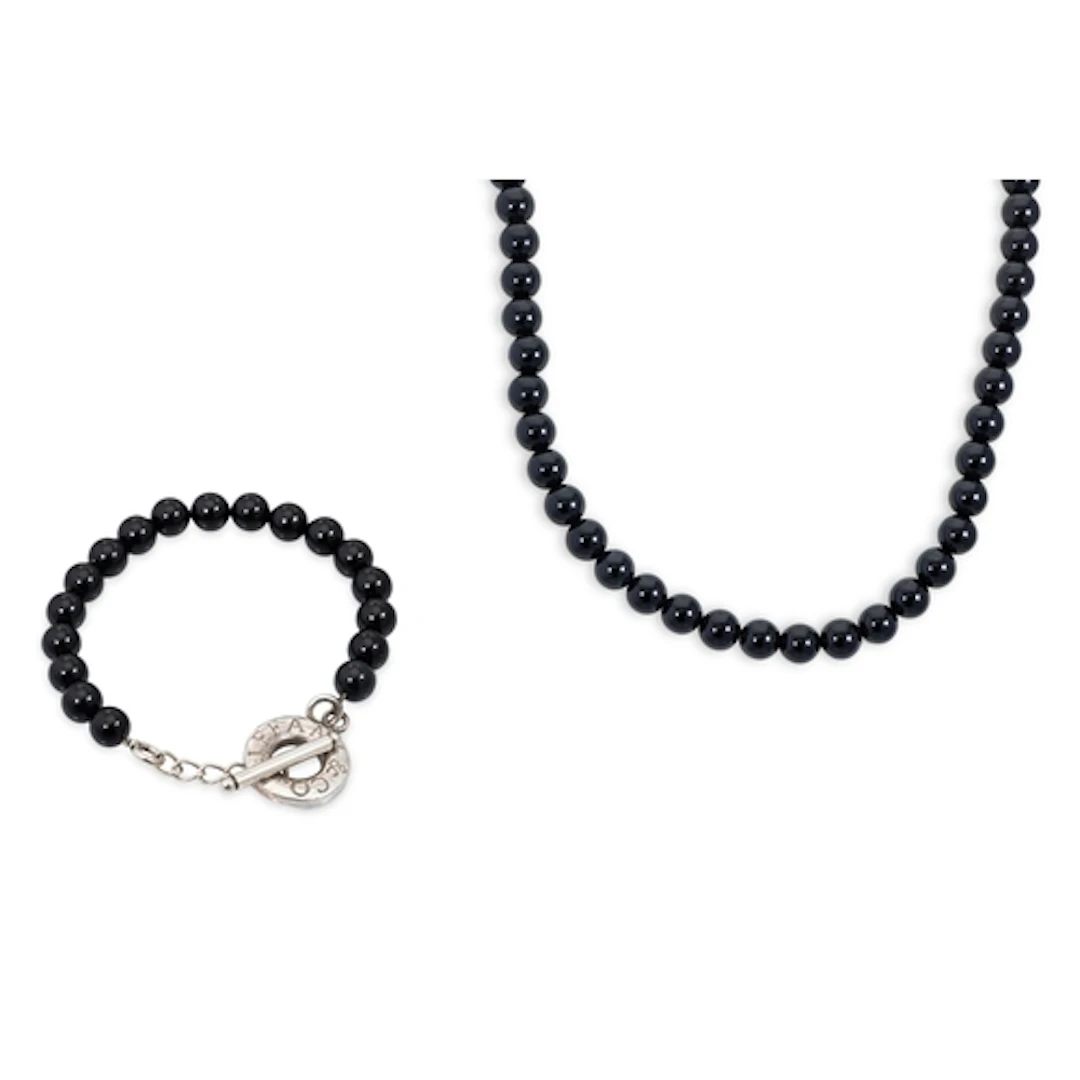 A SUITE OF BEADED JEWELLERY, comprising black glass beads wi...