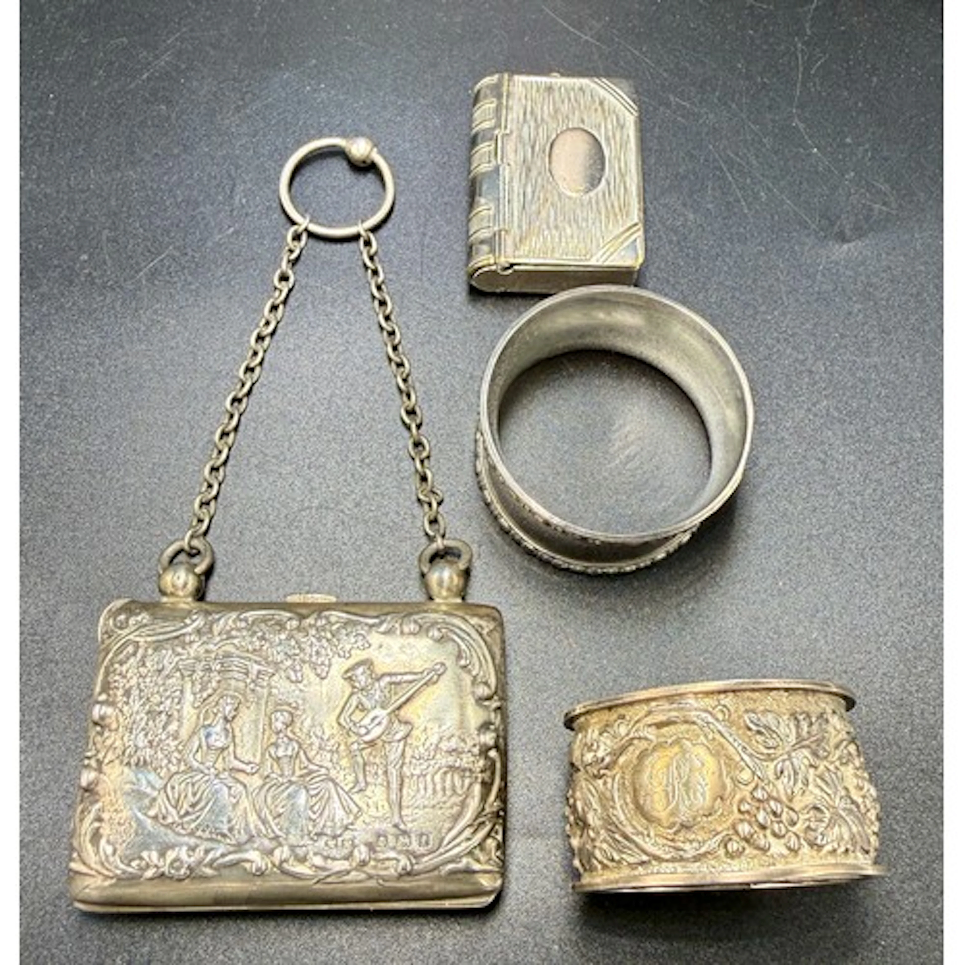 Hallmarked silver embossed purse with finger ring, Birmingha...