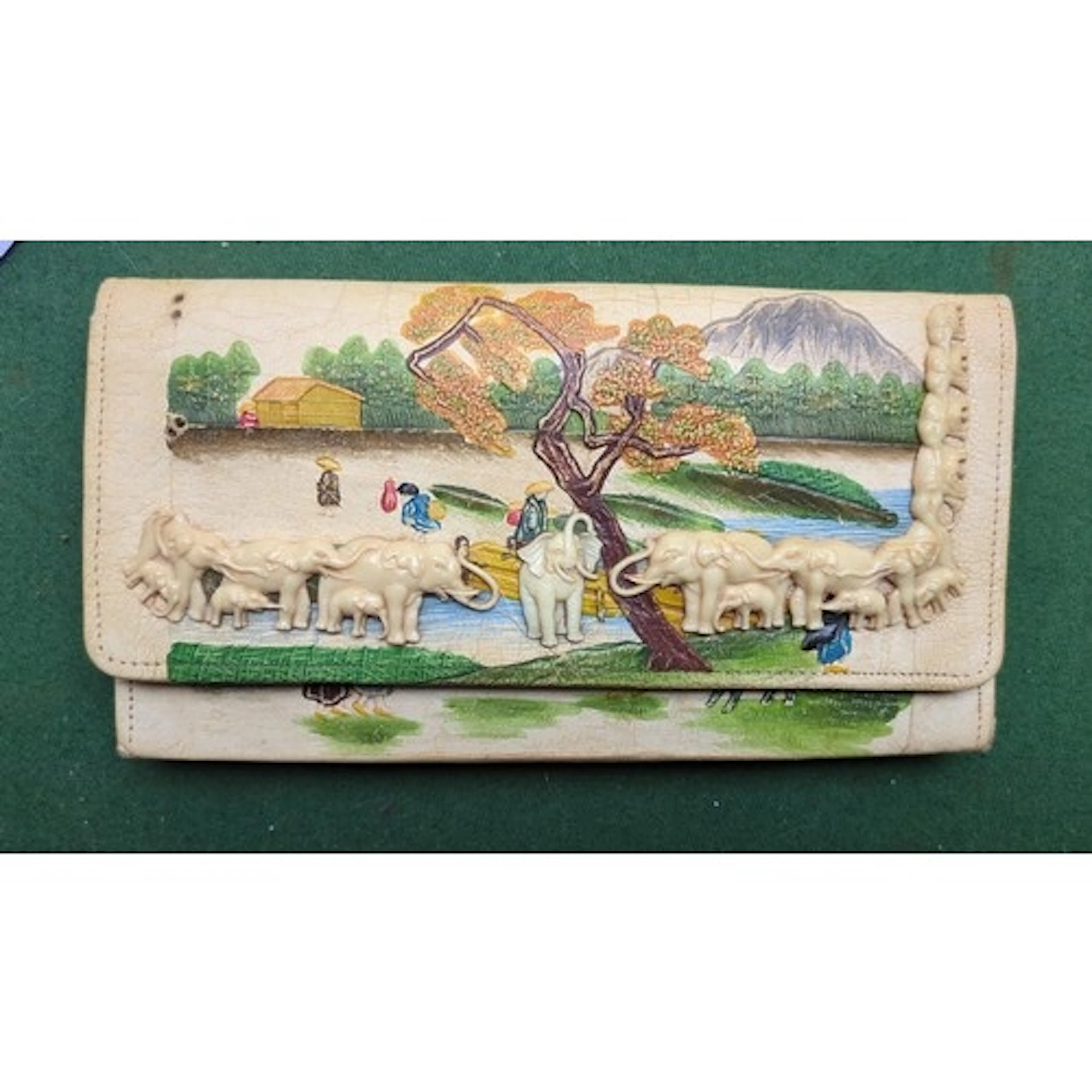 Mid-20th century leather clutch wallet with polychrome paint...