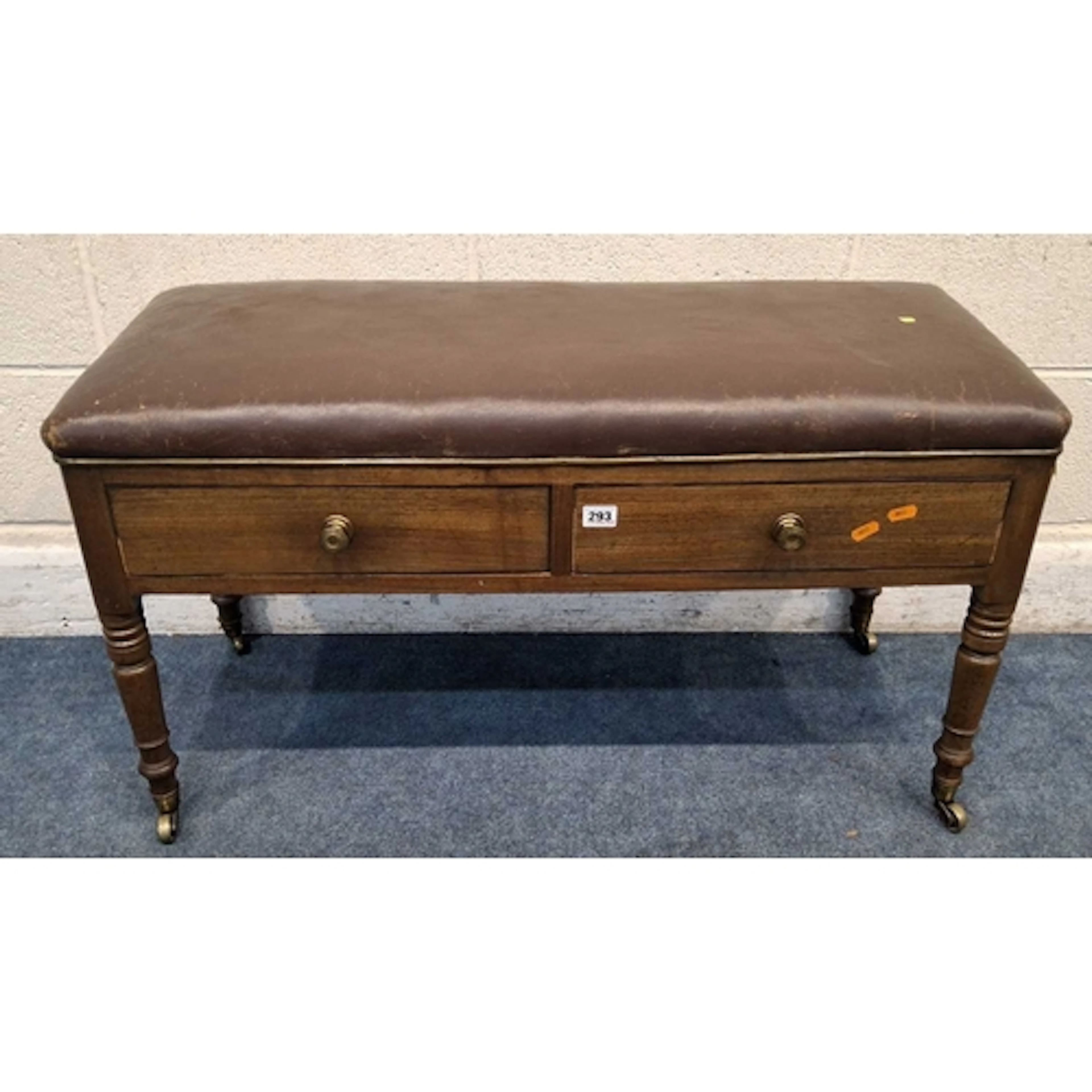 AN EARLY 19TH CENTURY DUET PIANO STOOL, with a leather seat,...