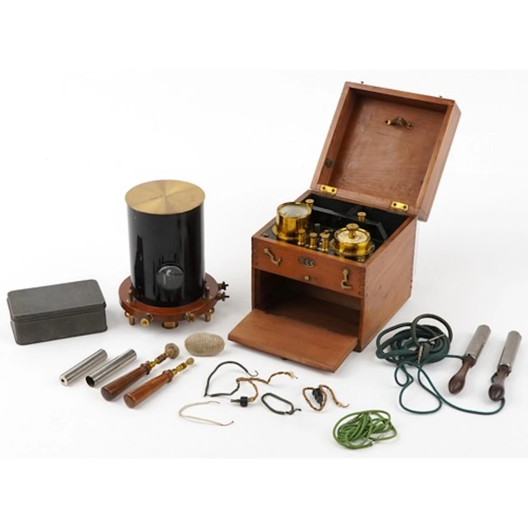 Two early 20th century electrical/scientific apparatus compr...