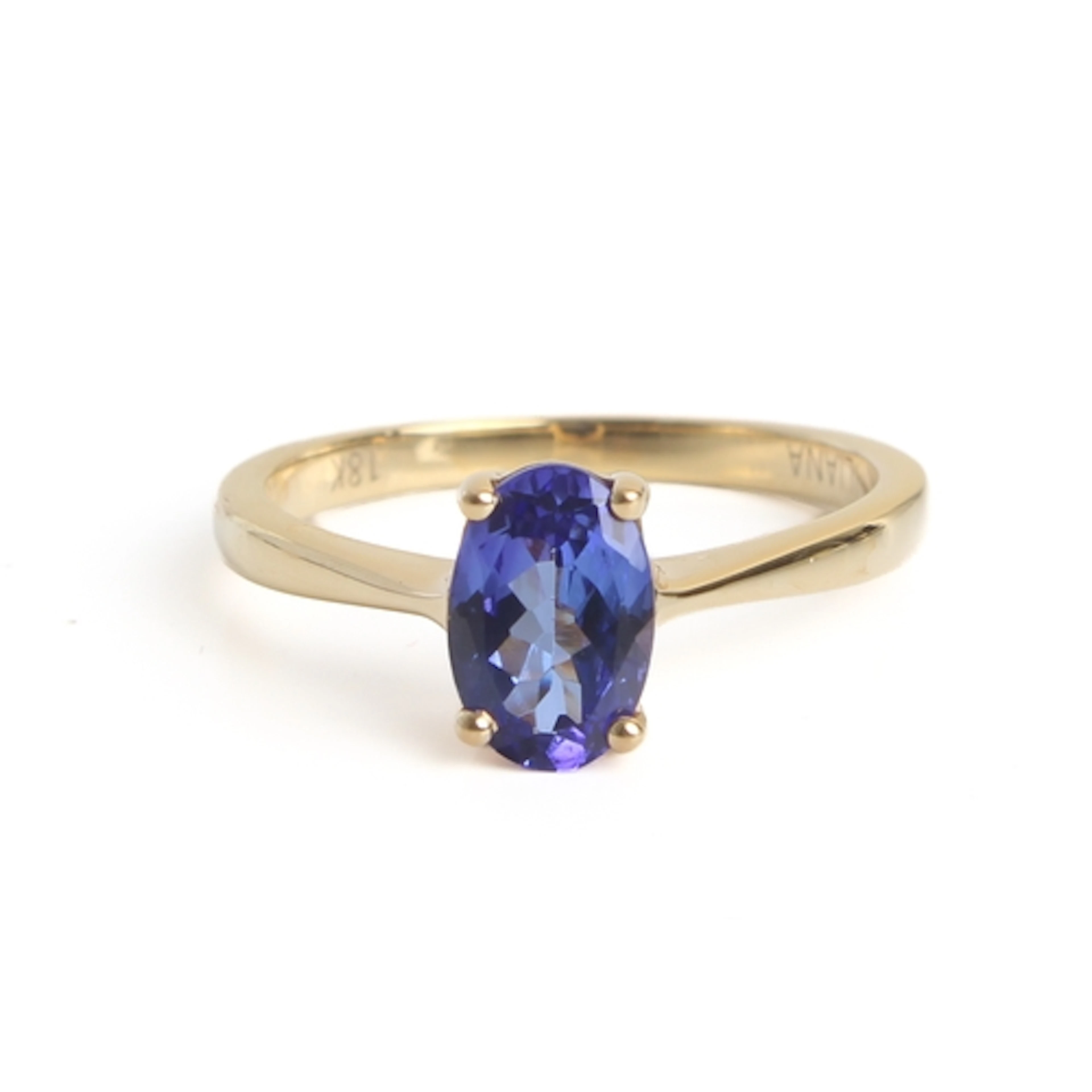 An Iliana 18ct yellow gold and Tanzanite single stone ring -...