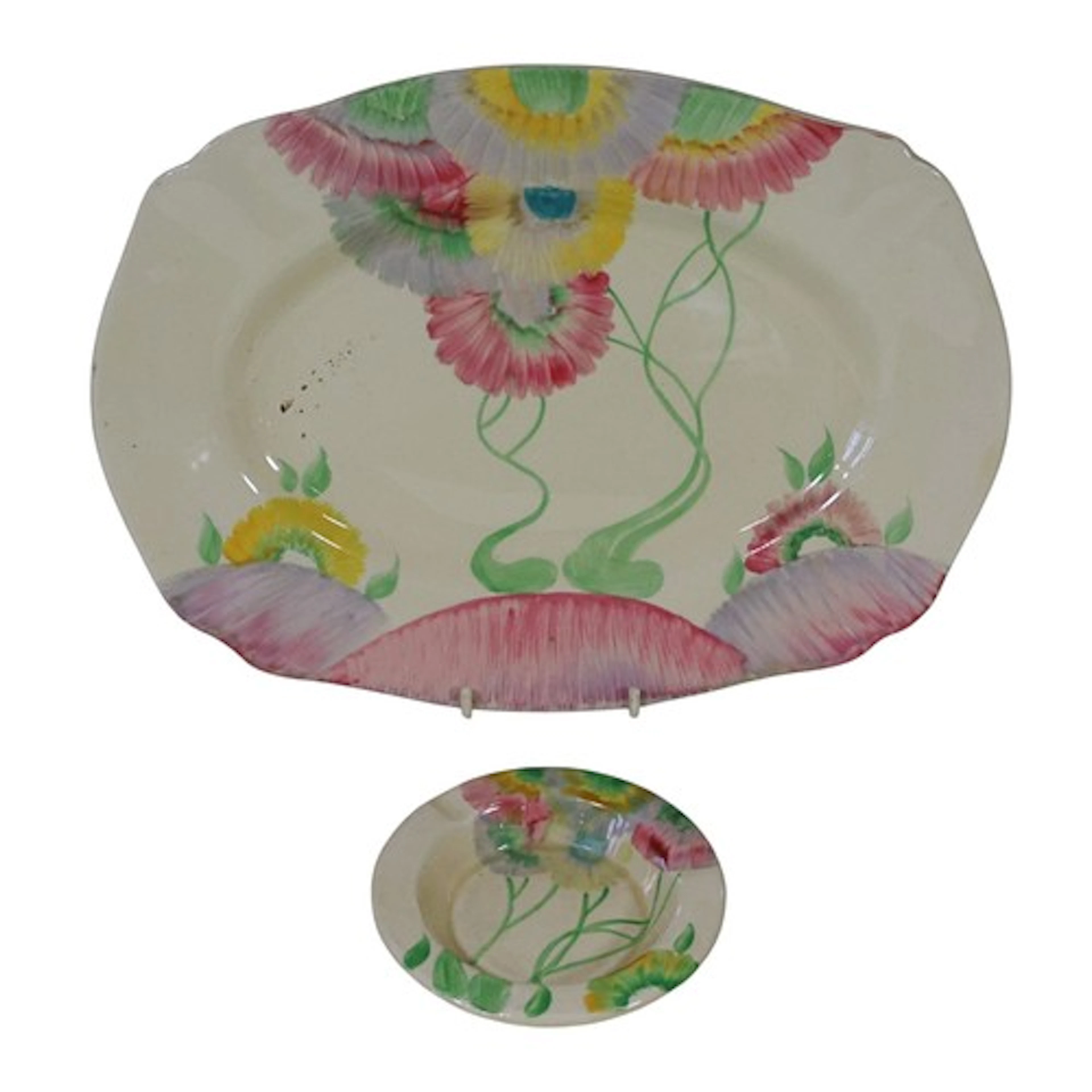 A Clarice Cliff ‘pink pearls’ pattern dish, 31 cm and matchi...
