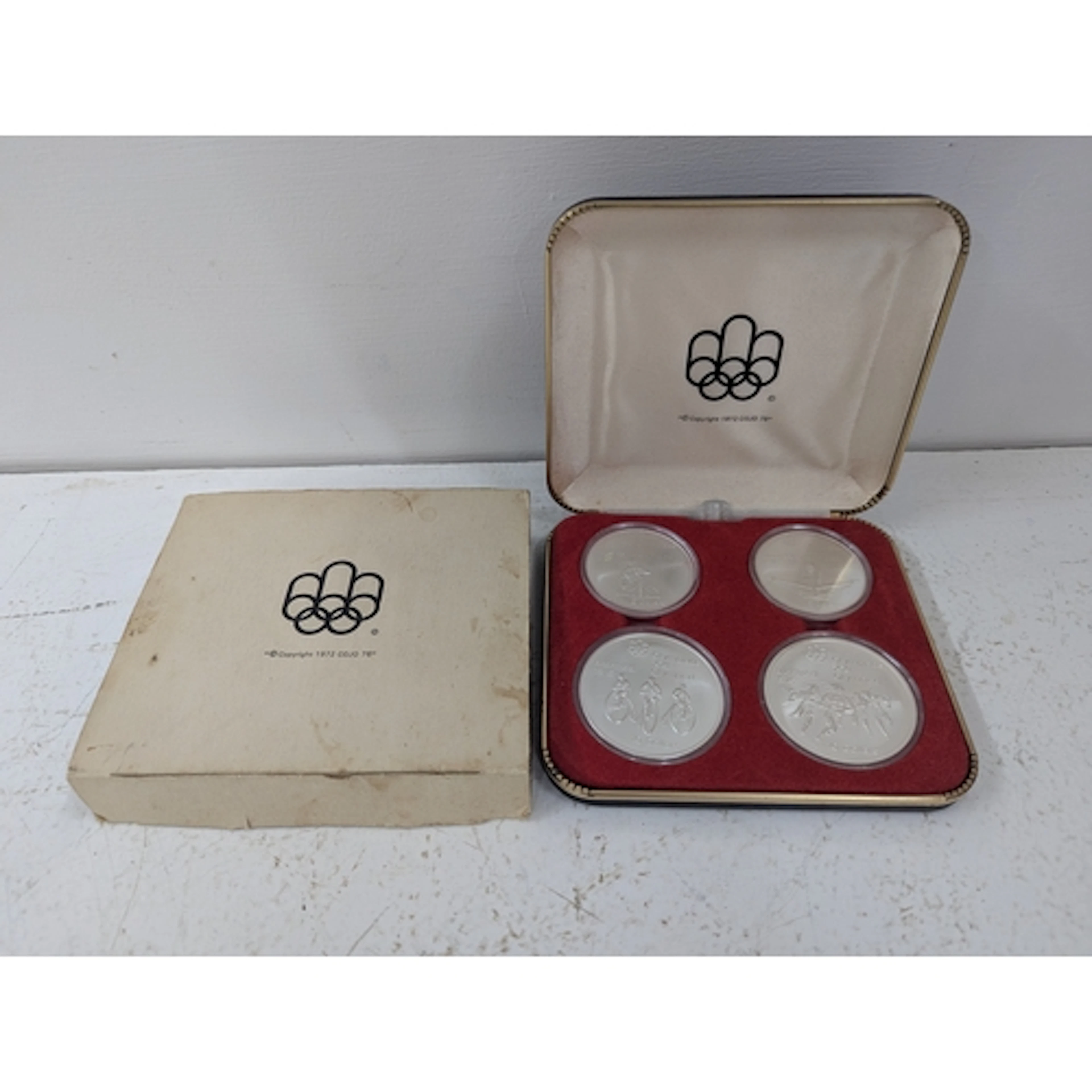 An Olympic silver Canadian coin set to include two 5 dollar ...