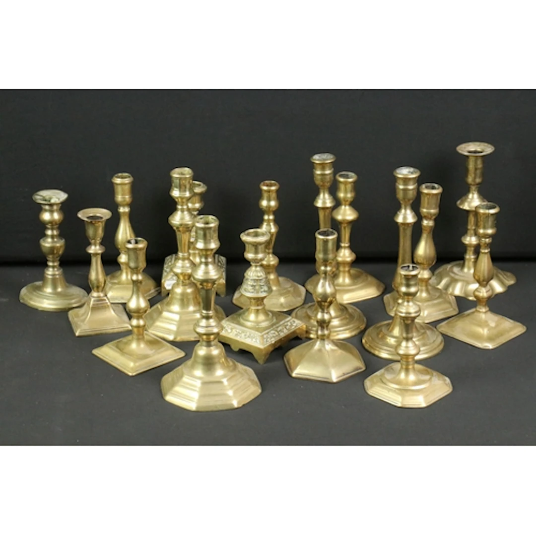 Collection of brass candlesticks to include Victorian and Ea...