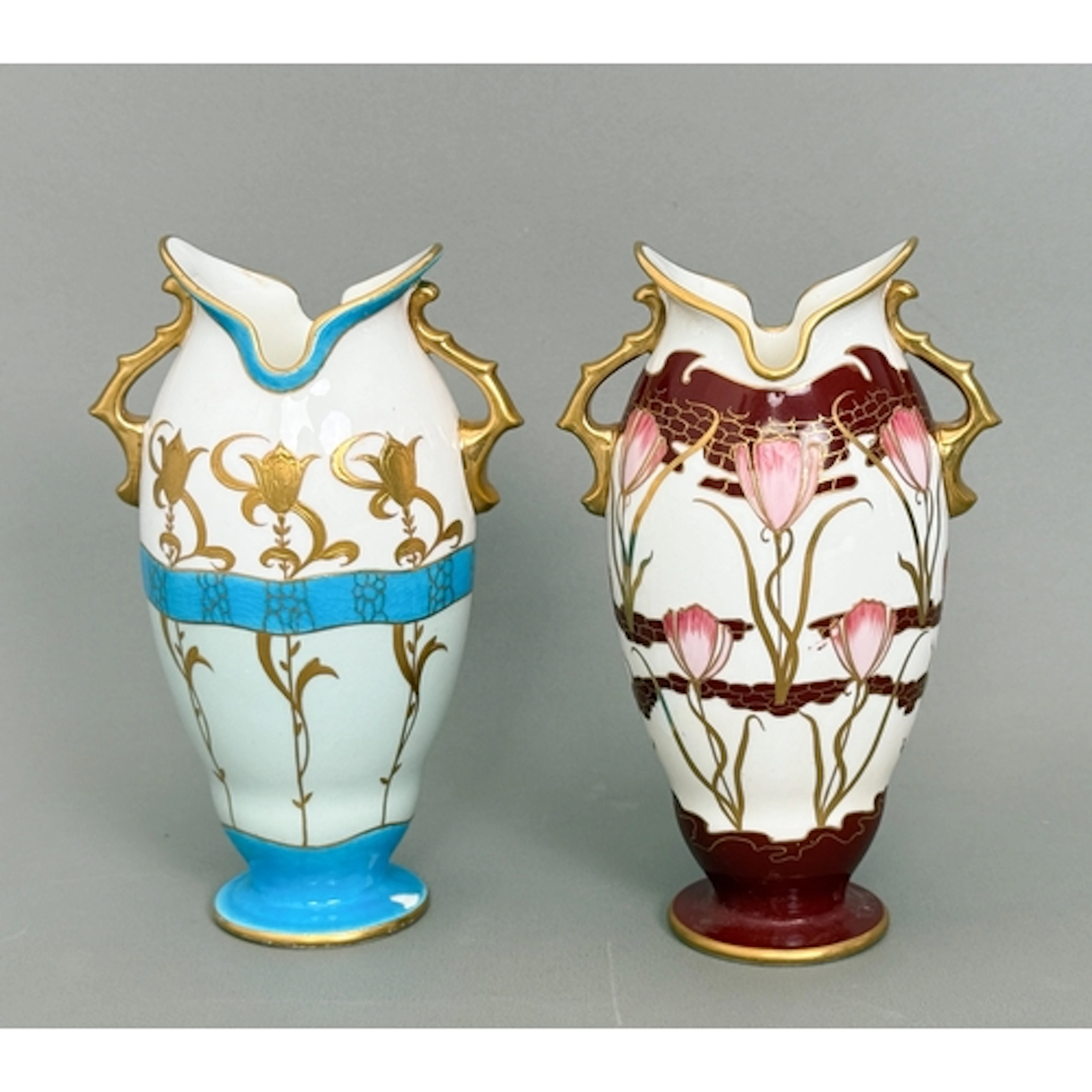Two Mintons porcelain Art Nouveau vases - of matching shape,...