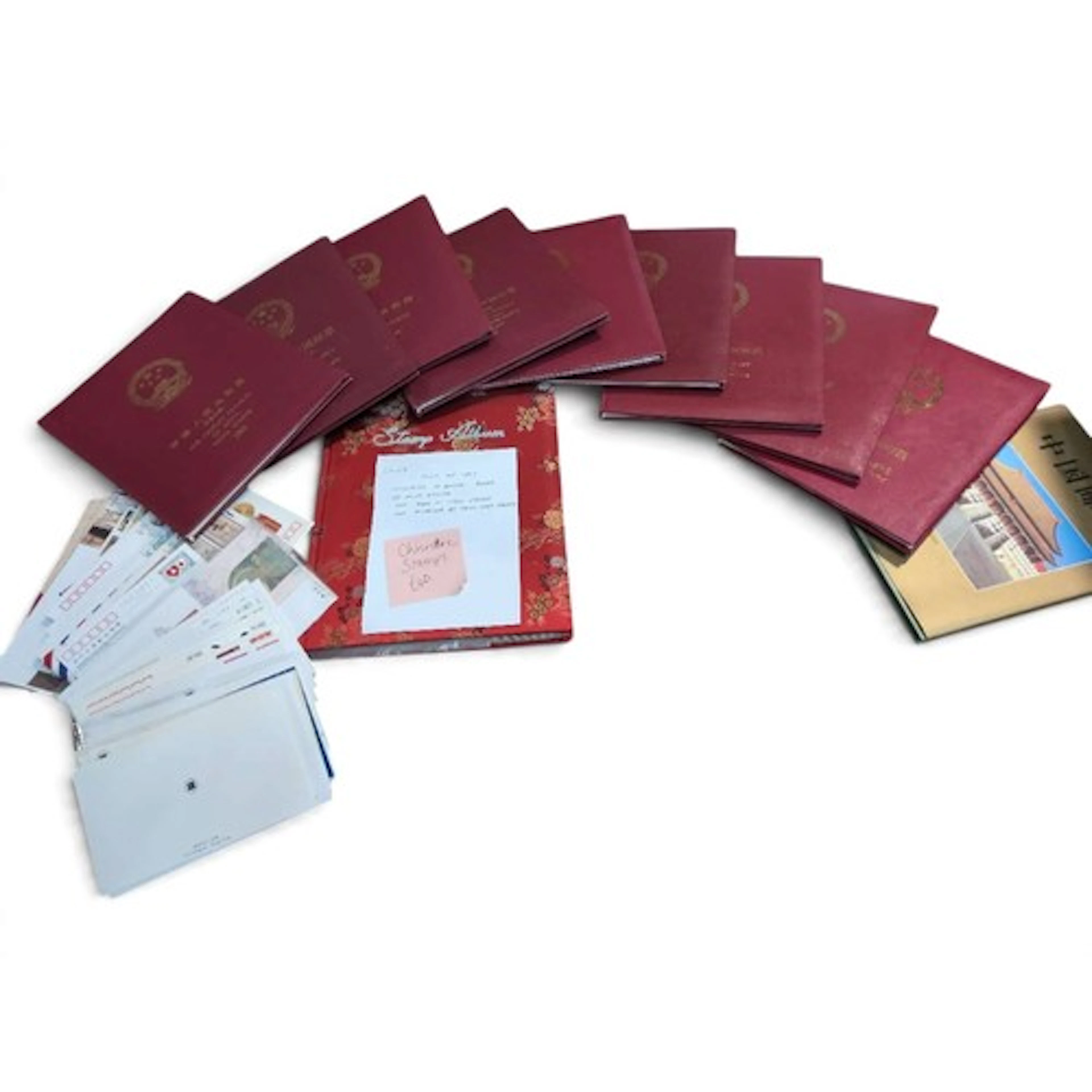 Box of Chinese Republic stamps across several albums; togeth...