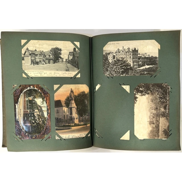 A Art Nouveau album of post cards and a selection of stamps ...