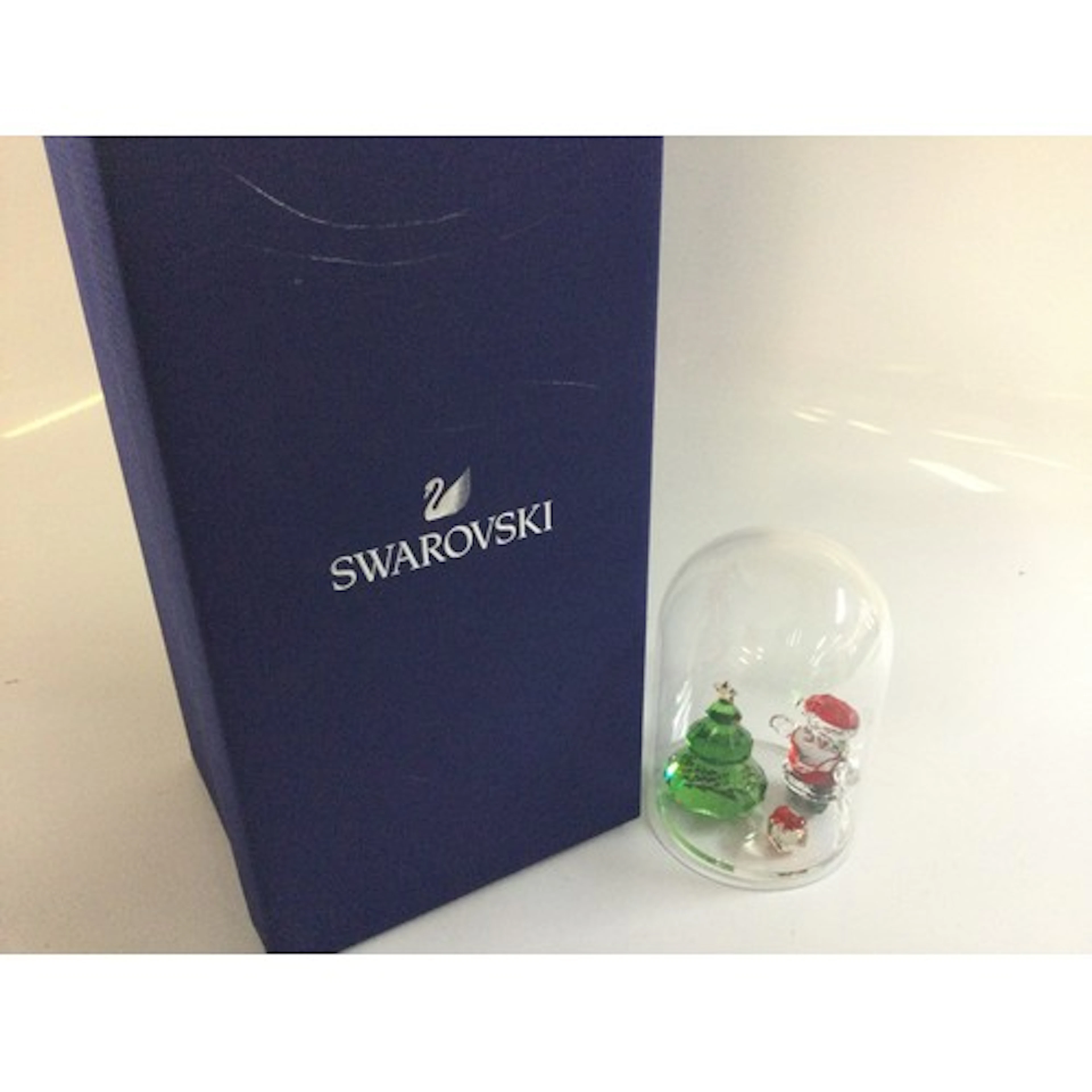 A boxed Swarovski ornament Joyful Bell Jar set (article numb...