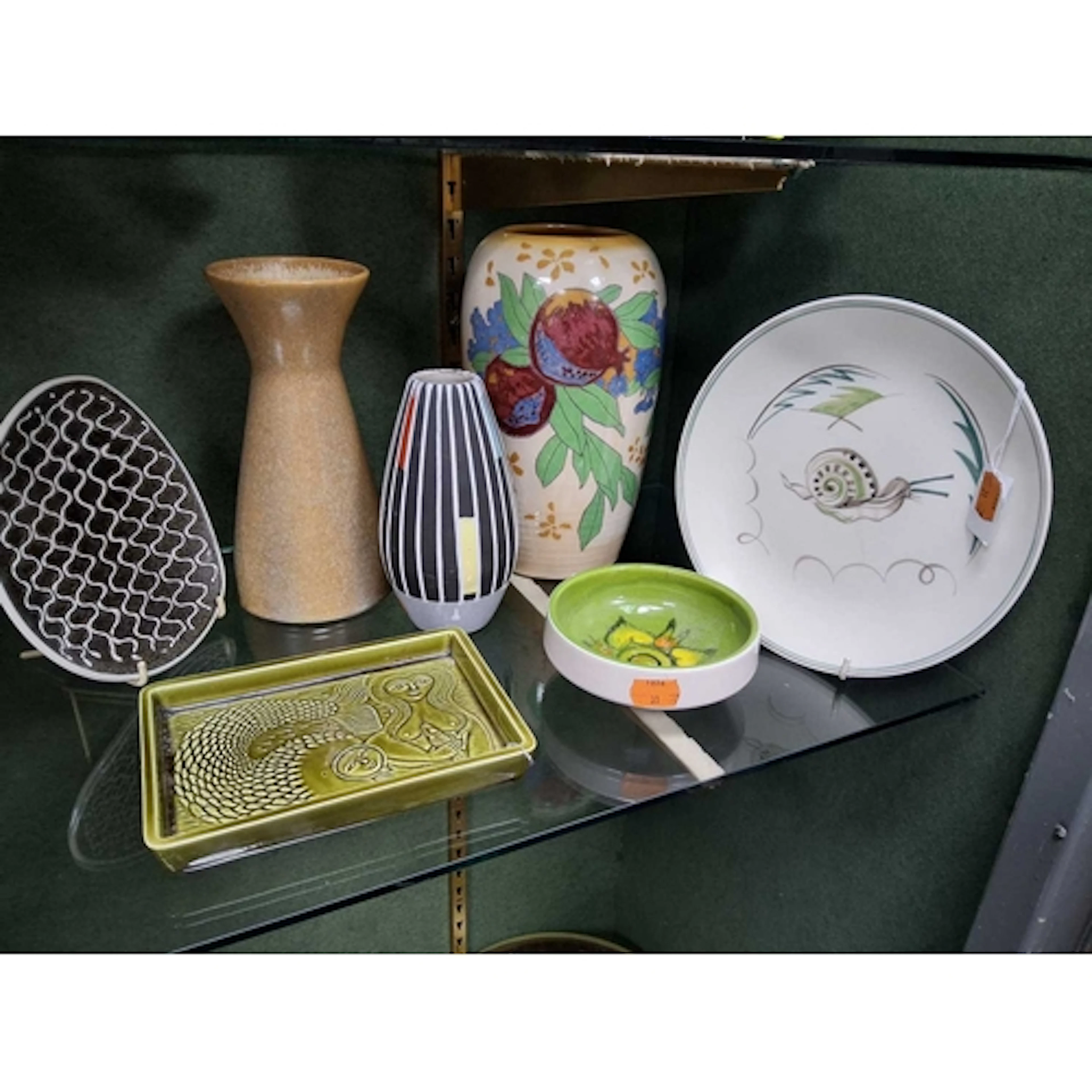 A GROUP OF VINTAGE DECORATIVE CERAMIC PIECES comprising a Po...