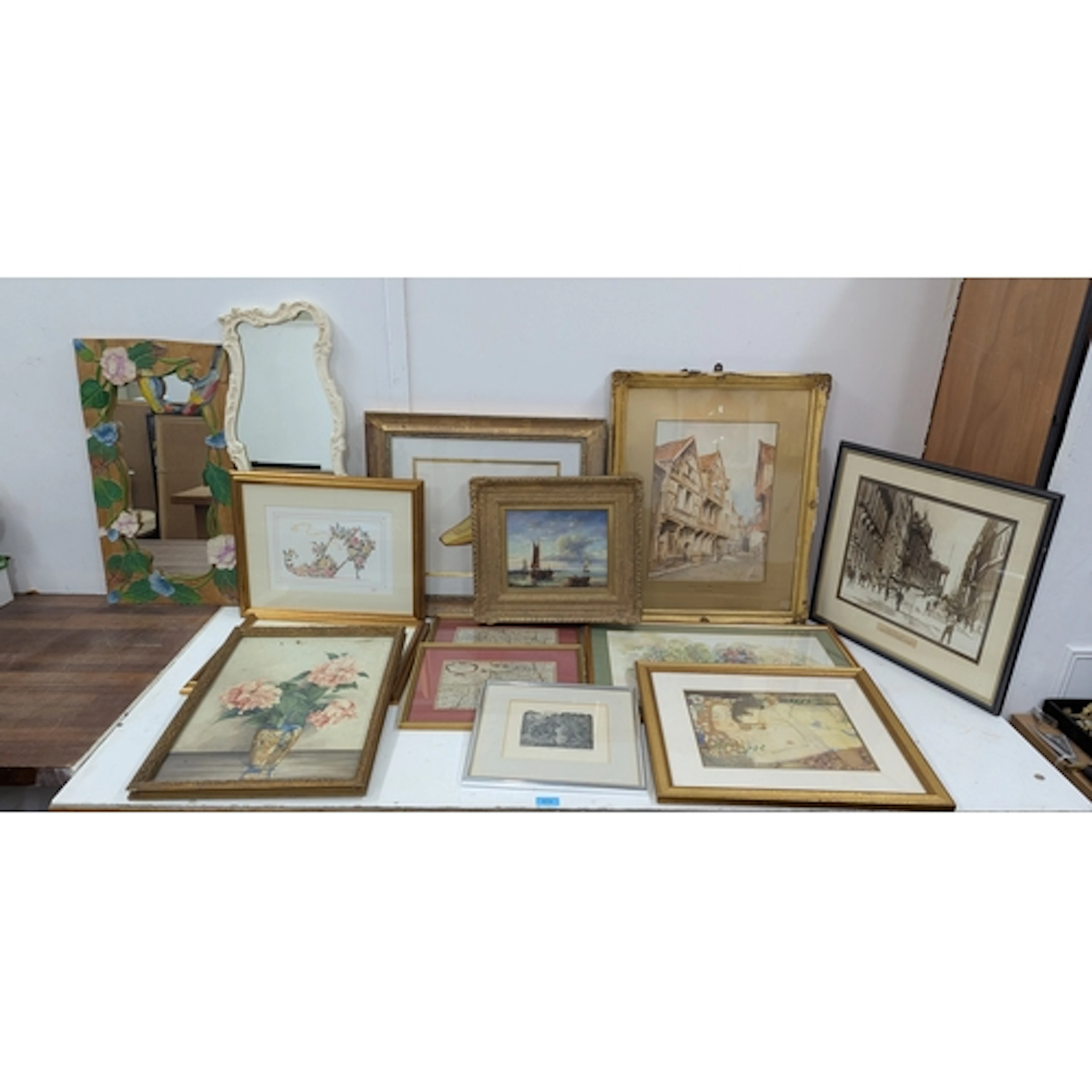 Assorted pictures to include a print of a shoe, prints of st...