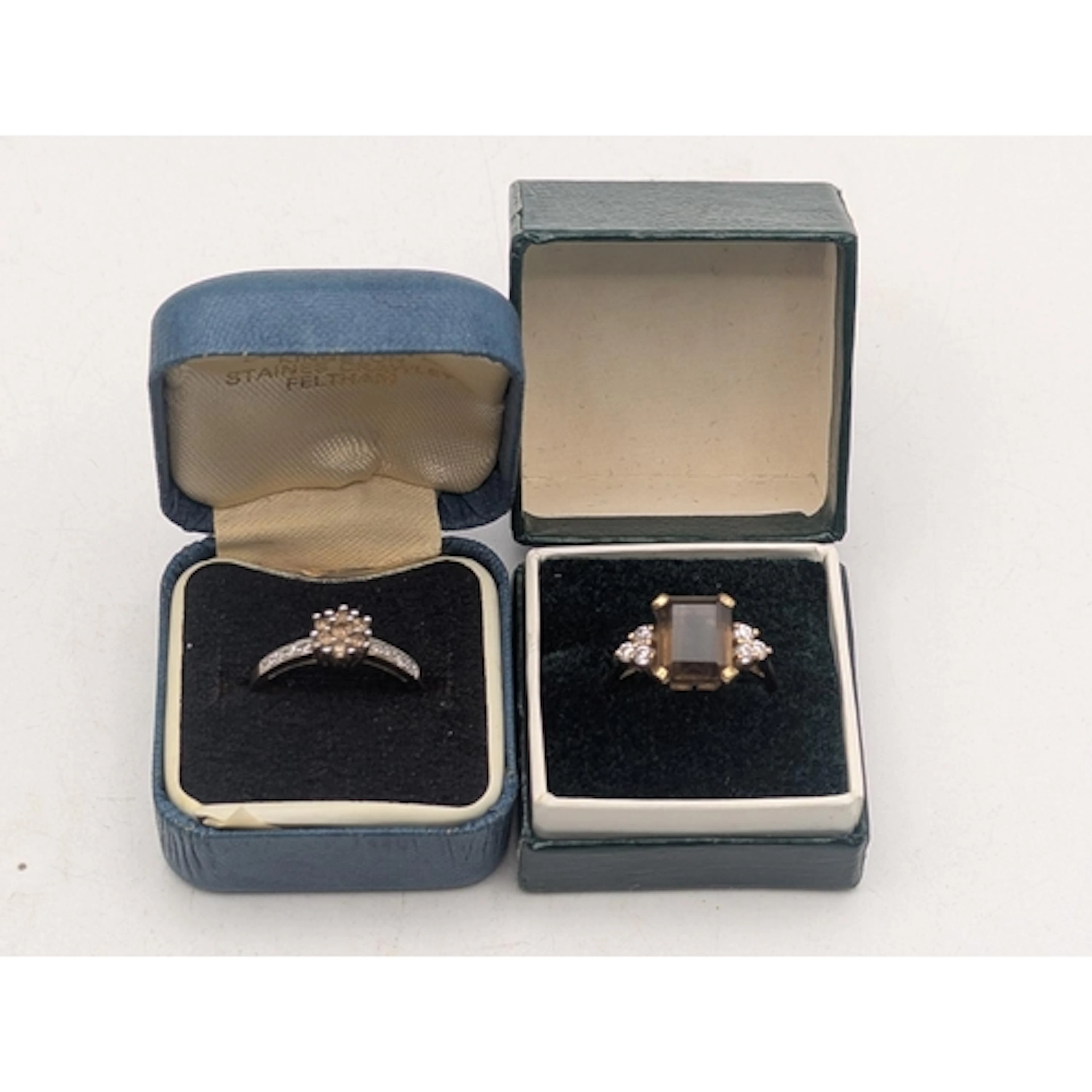Two 9ct yellow gold rings, including a yellow and white diam...