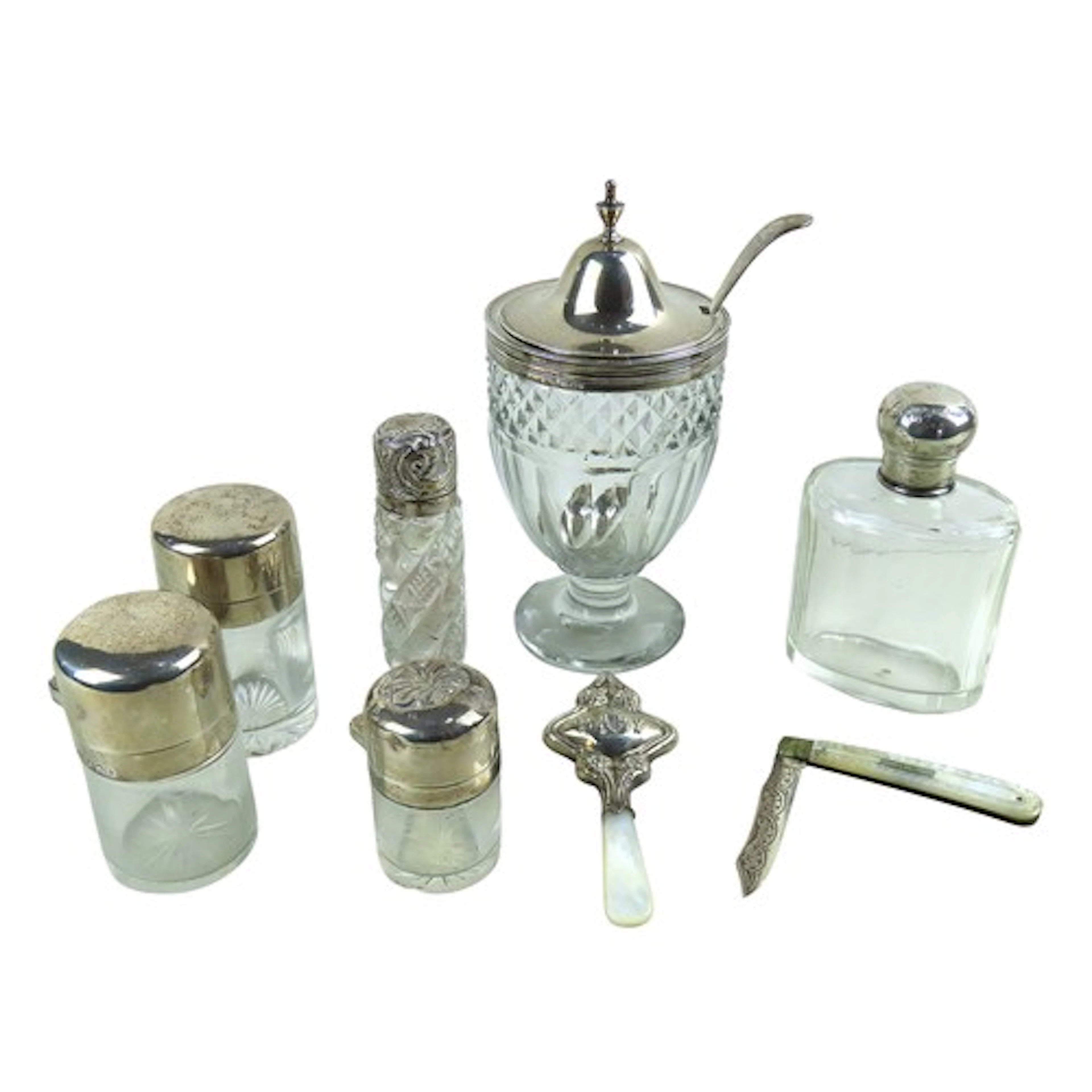 AN ELEGANT SILVER MOUNTED GLASS MUSTARD POT together with fi...
