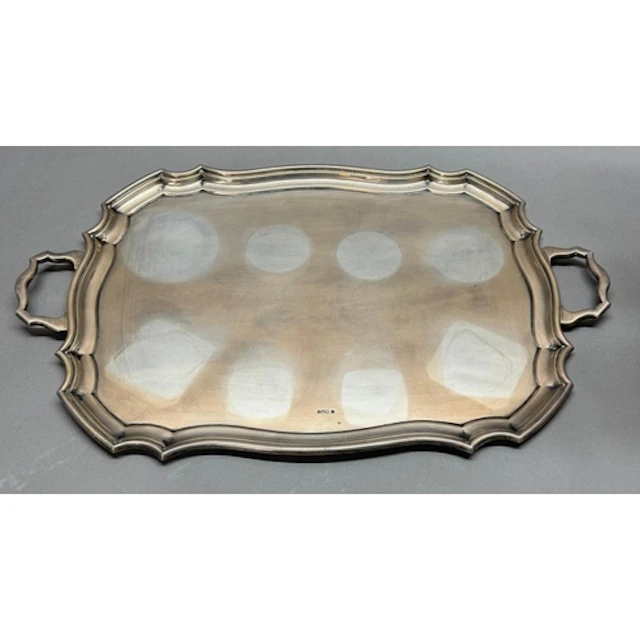 A two handled silver tray, hallmarked for Sheffield 1921 by ...