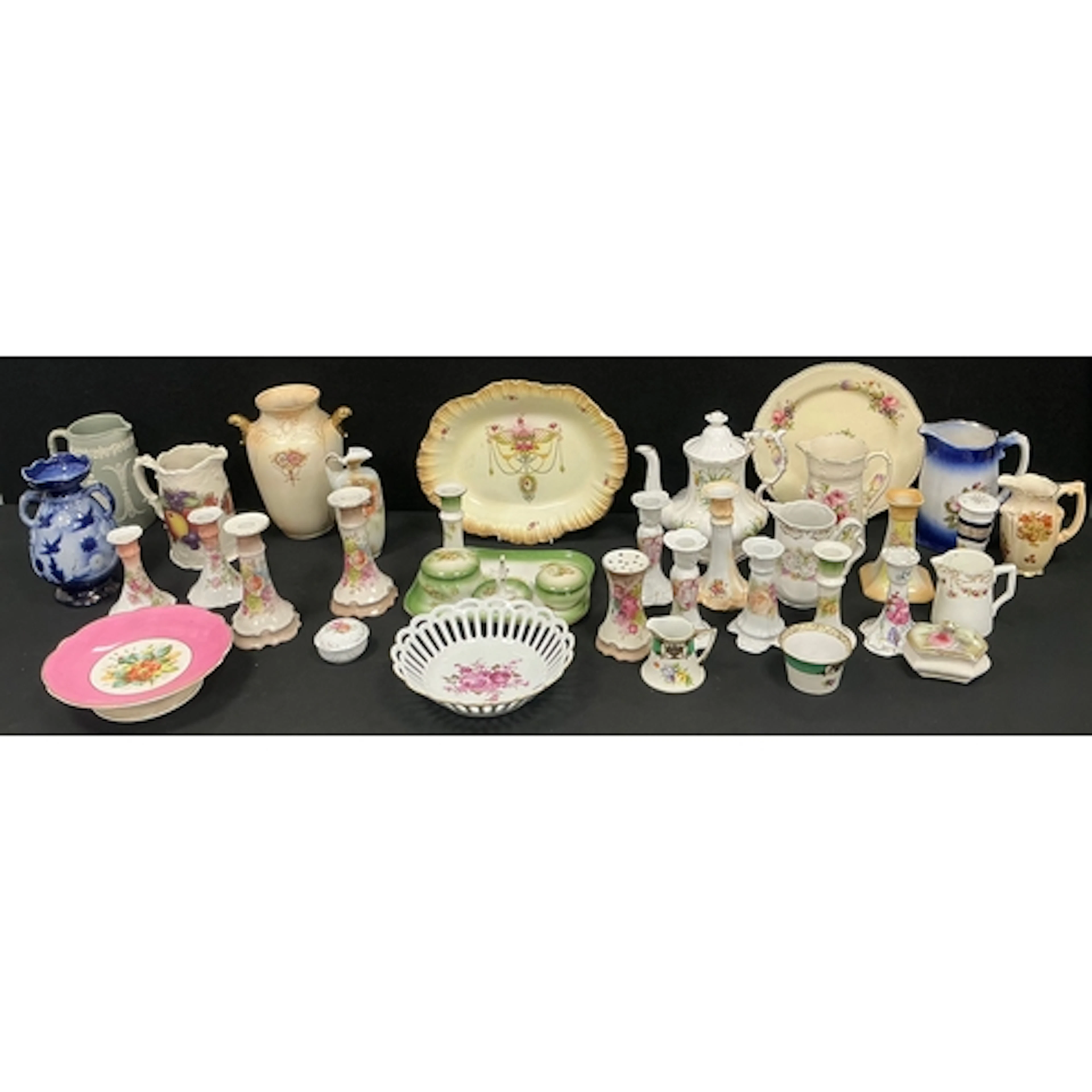 A crown Devon blush ivory twin handles vase; a Hanley falcon...