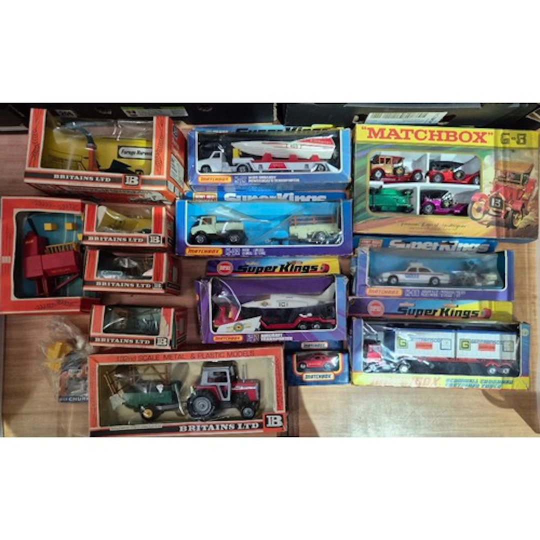 A box of assorted diecast vehicles & accessories to include ...