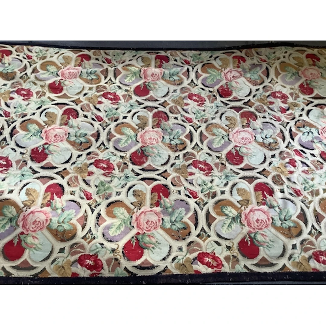 A late 19th early 20th century needle worked polychrome flor...
