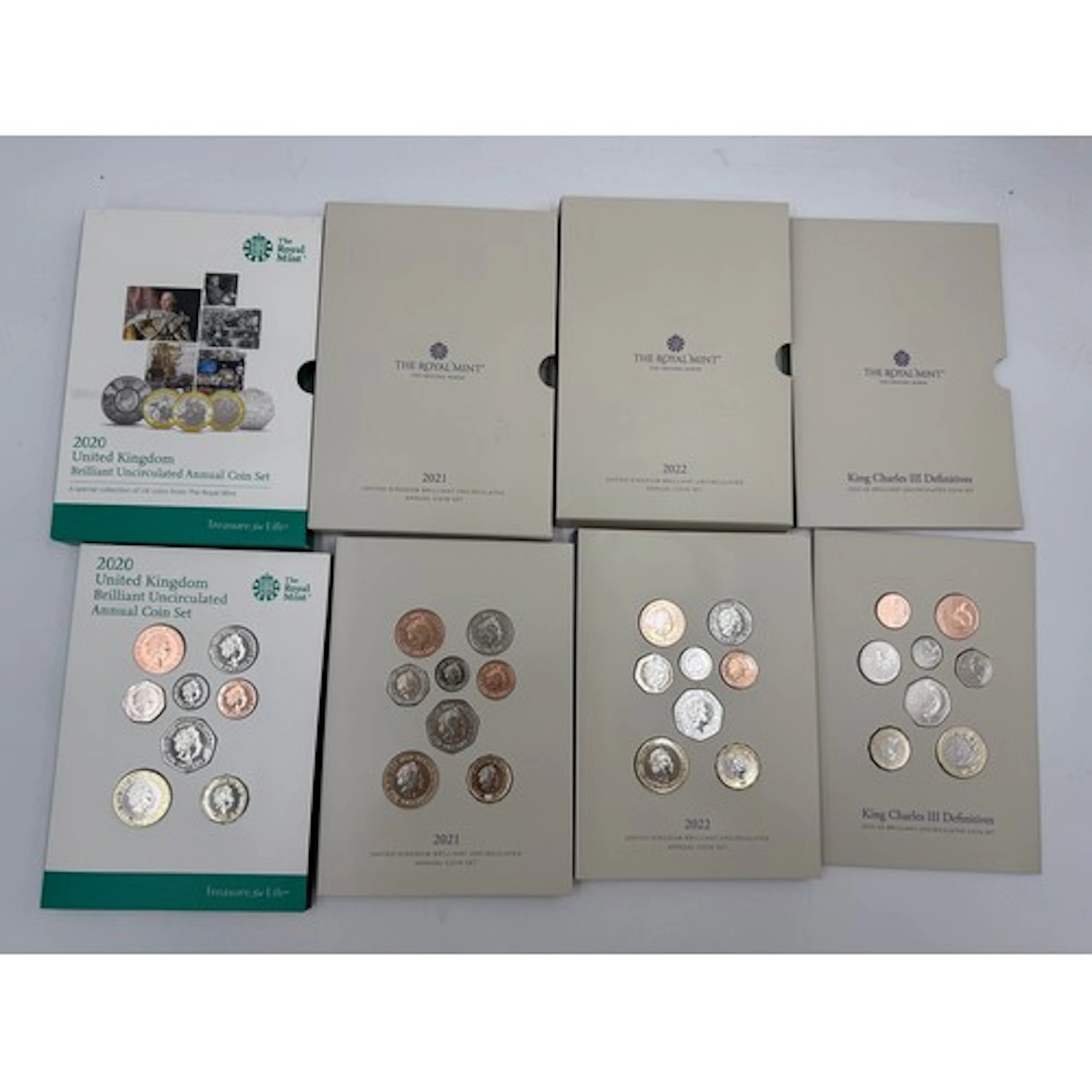 The Royal Mint Brilliant Uncirculated Annual Coin set x 4. 2...