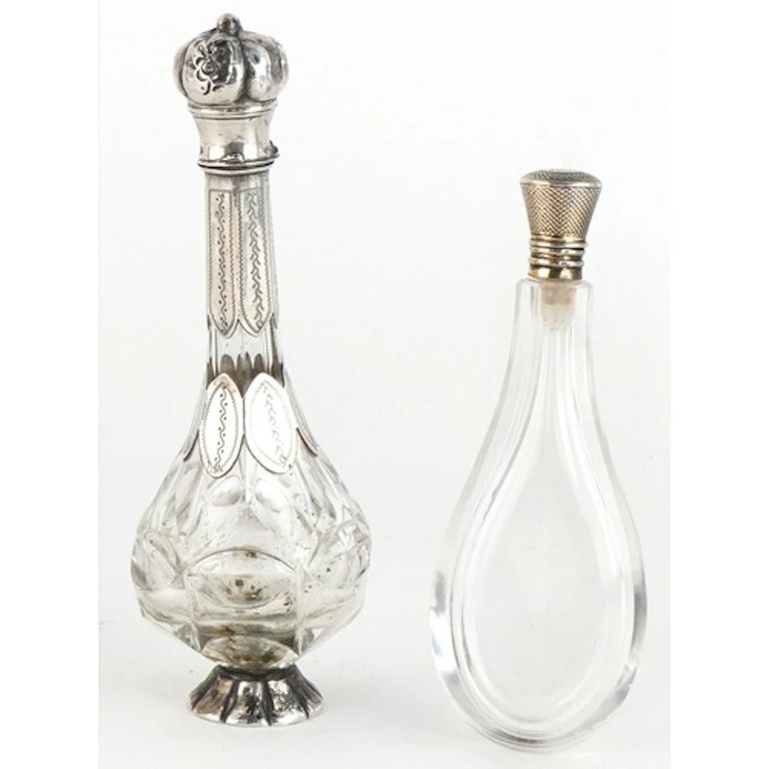 Two antique continental silver mounted glass scent bottles, ...