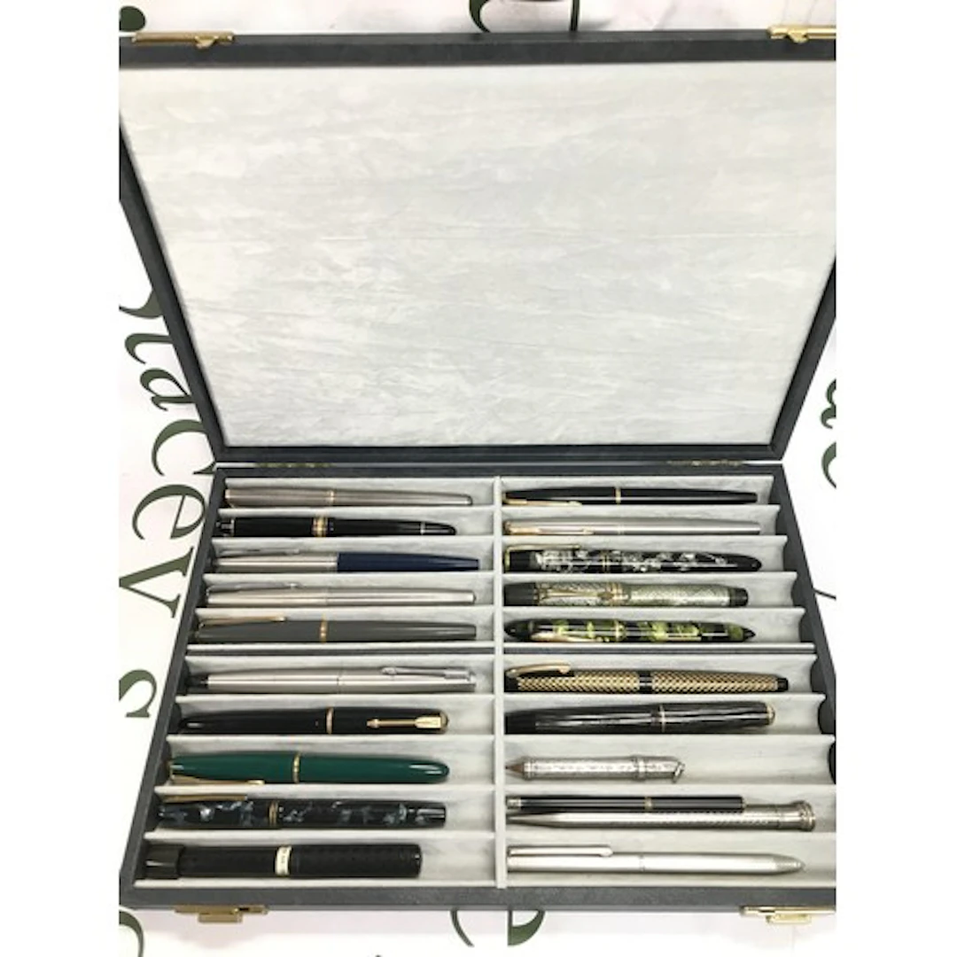 A collection of various pens including Parker, Montblanc, Sh...