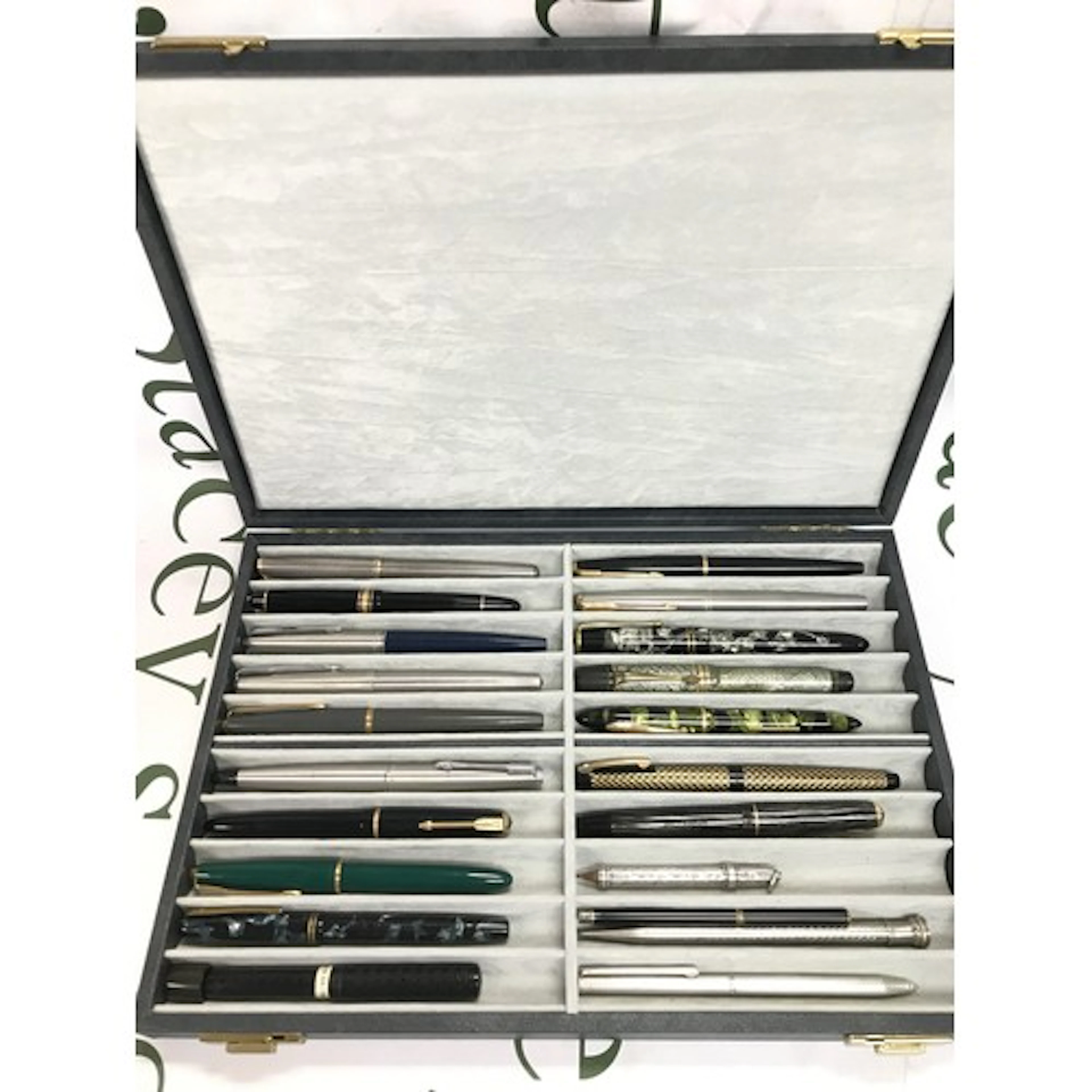 A collection of various pens including Parker, Montblanc, Sh...