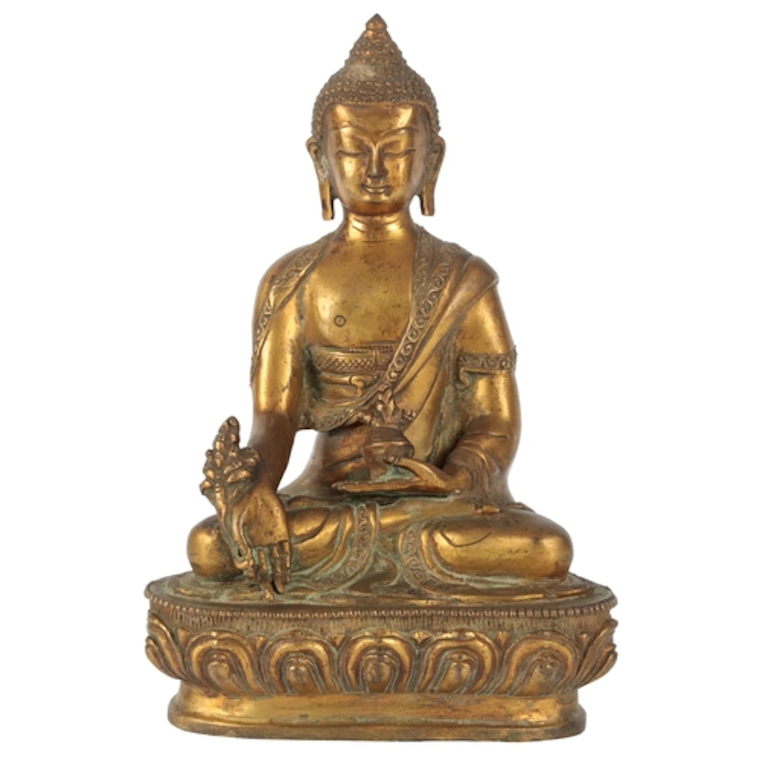 A Tibetan gilt bronze seated figure of Buddha Shakyamuni, 19...