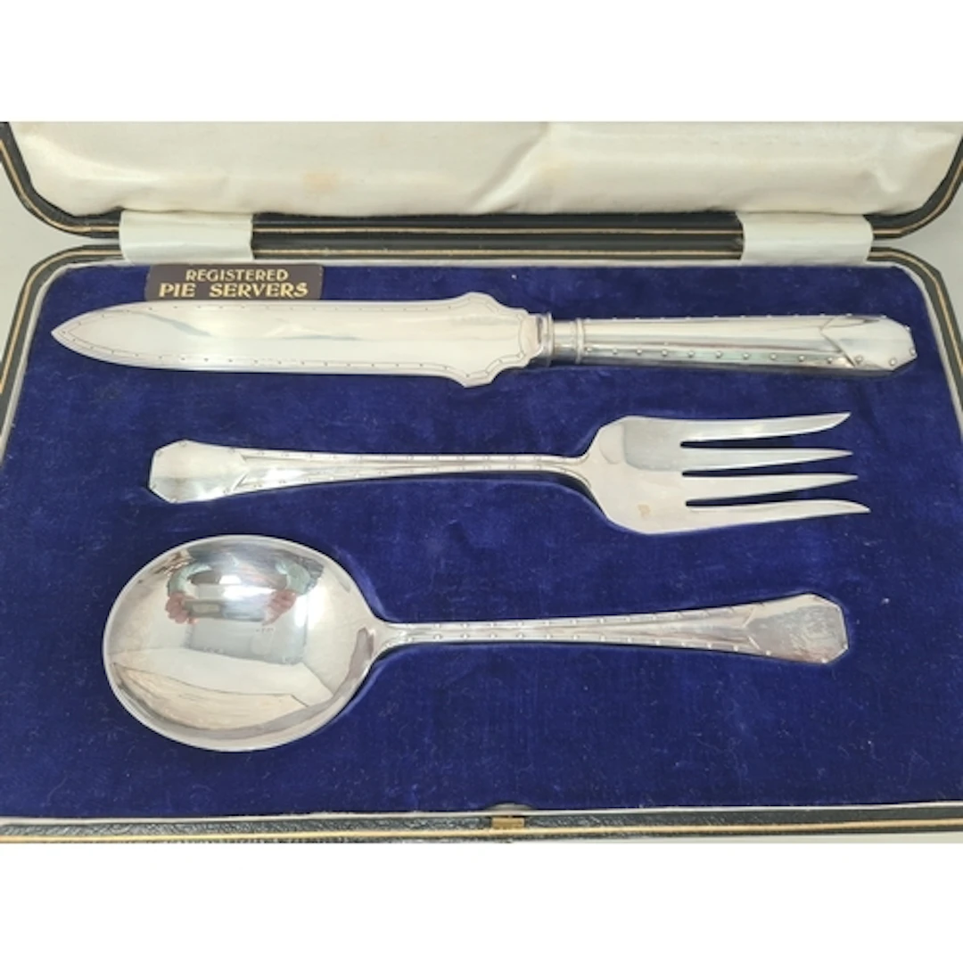 A Set of three plated Servers with beaded stems, in case