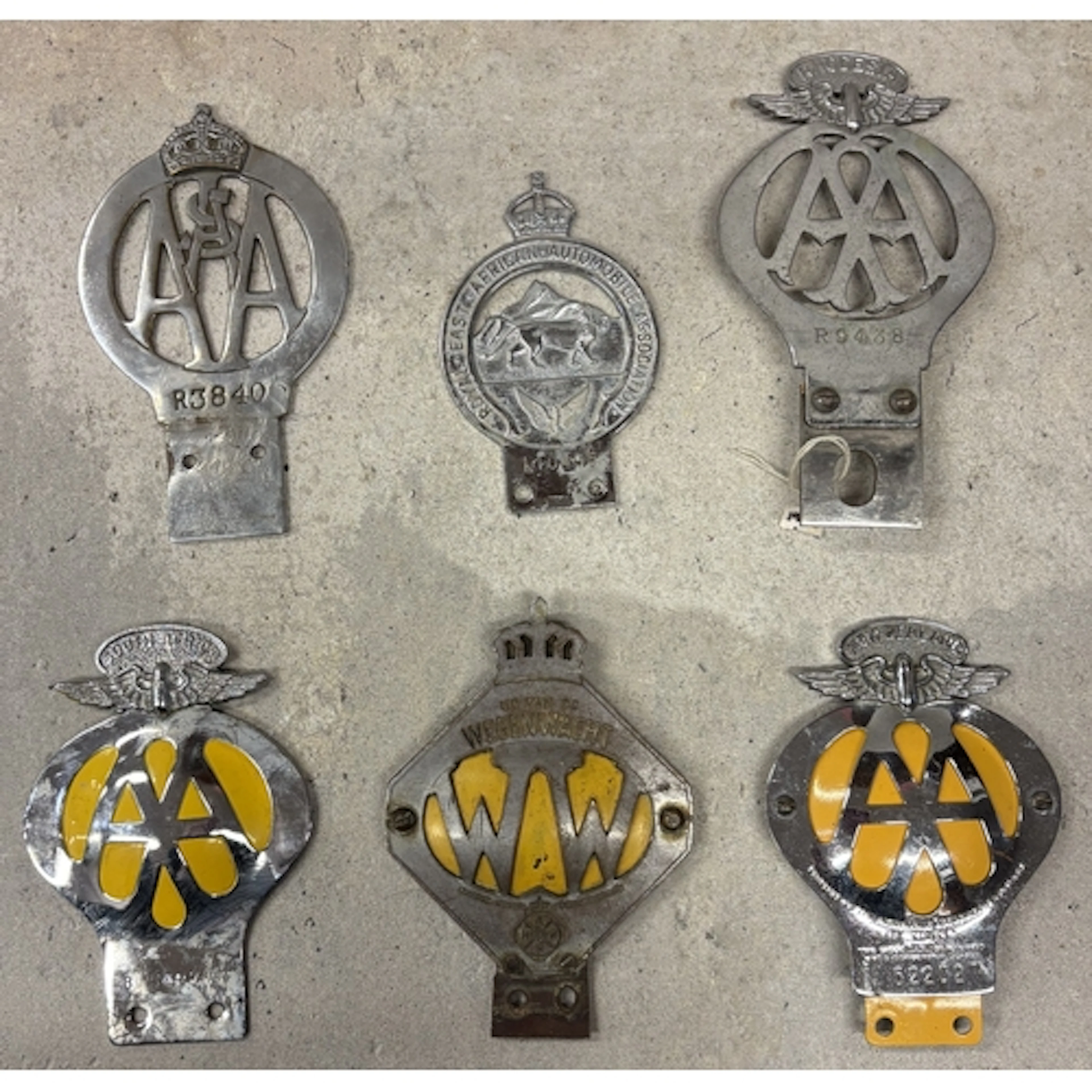 A collection of Empire and Commonwealth AA badges to include...