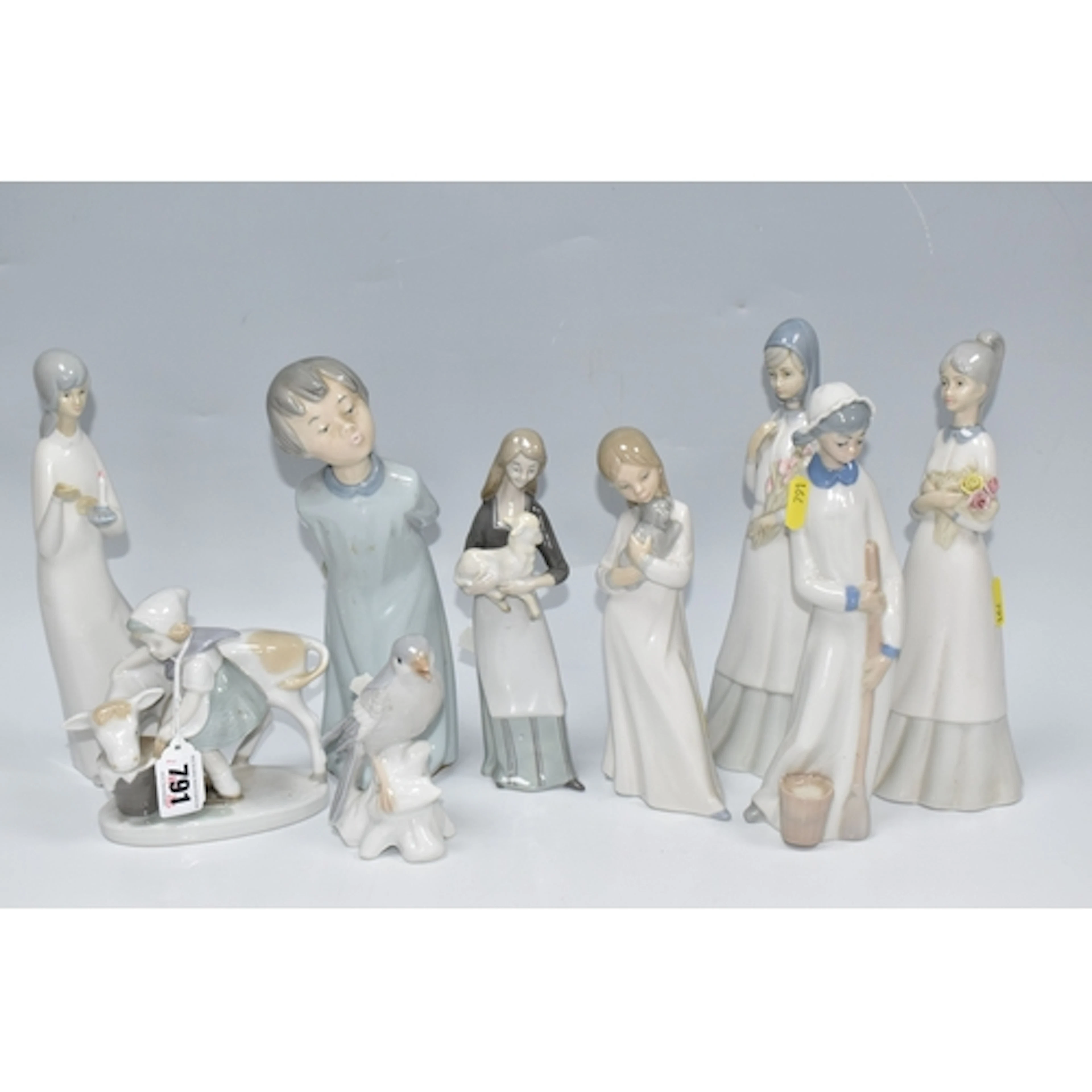A GROUP OF NINE SCULPTURES mostly from Spanish manufacturers...