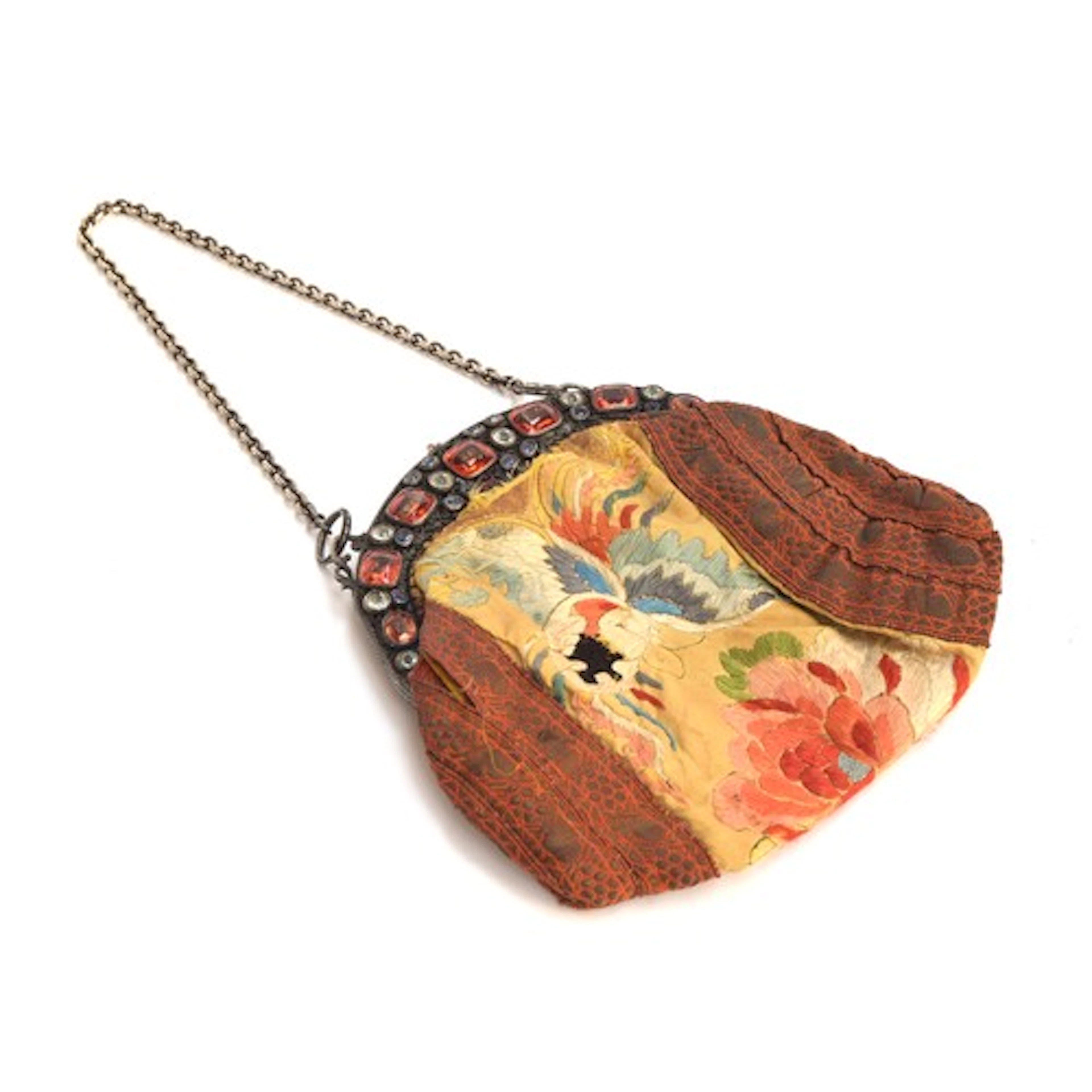 A late 19th/early 20th century ornately pierced silver purse...
