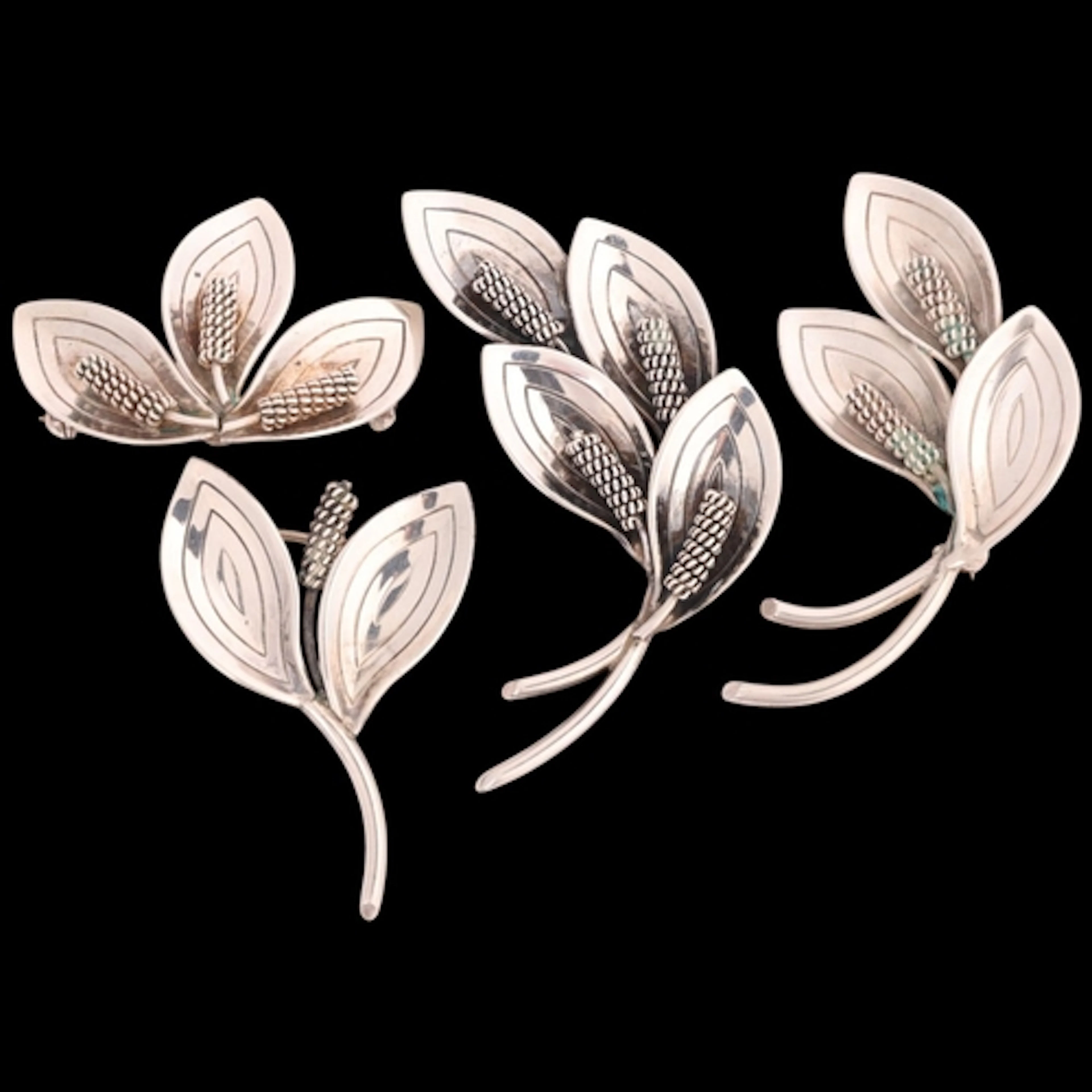 AARRE & KROGH - 4 Danish modernist sterling silver floral sp...