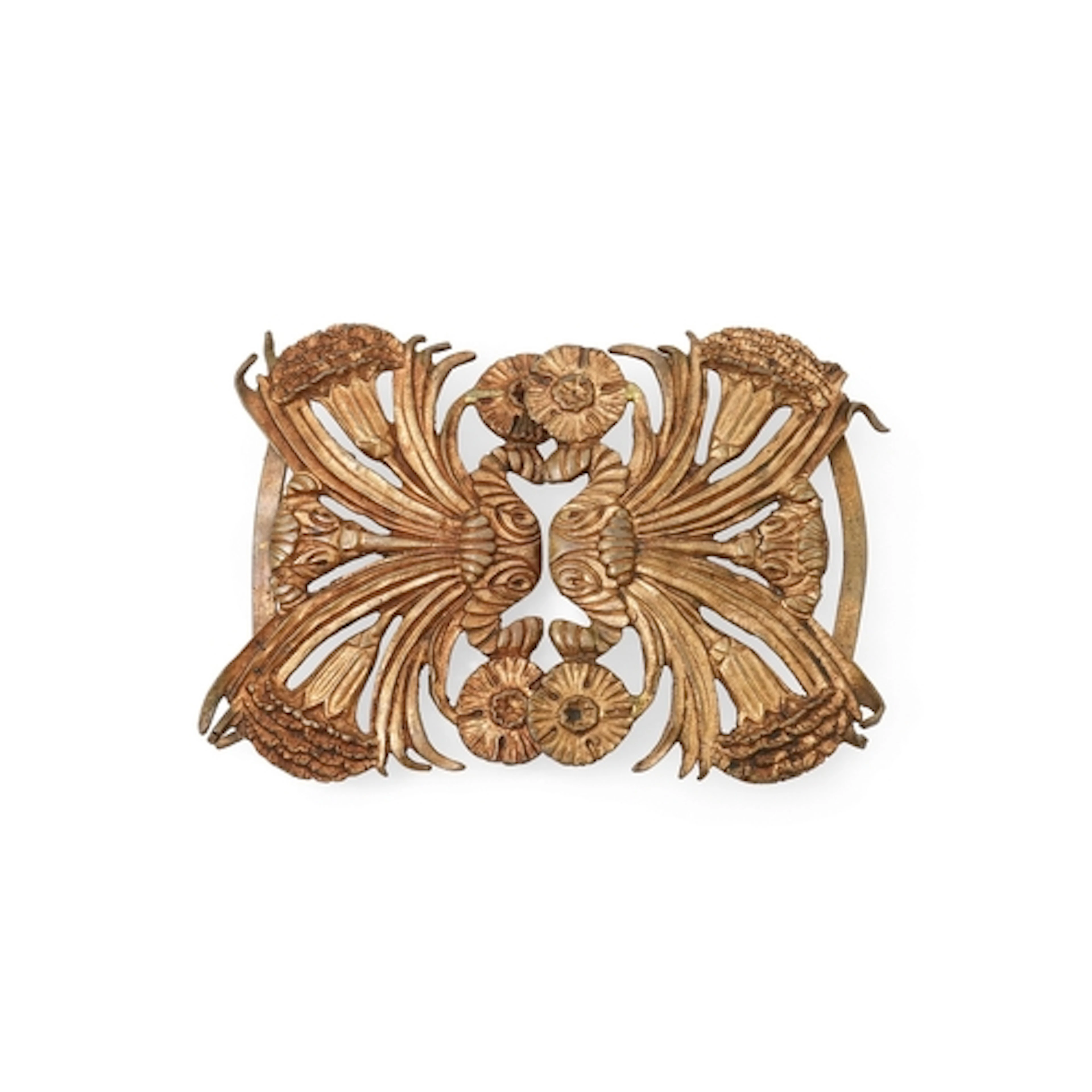 Line Vautrin, a gilt bronze belt buckle, designed as confron...