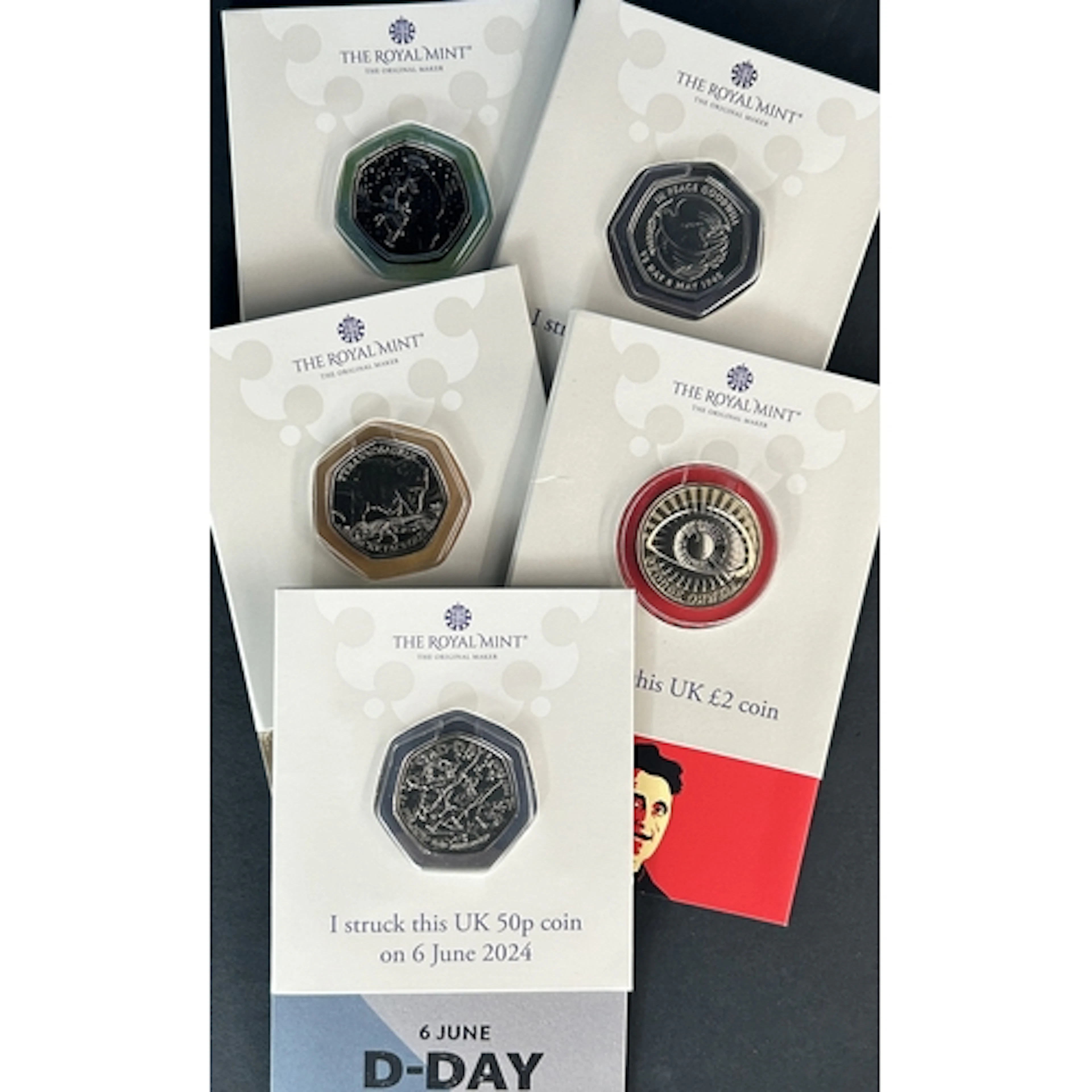 A group of five Great Britain Royal Mint Strike Your Own coi...