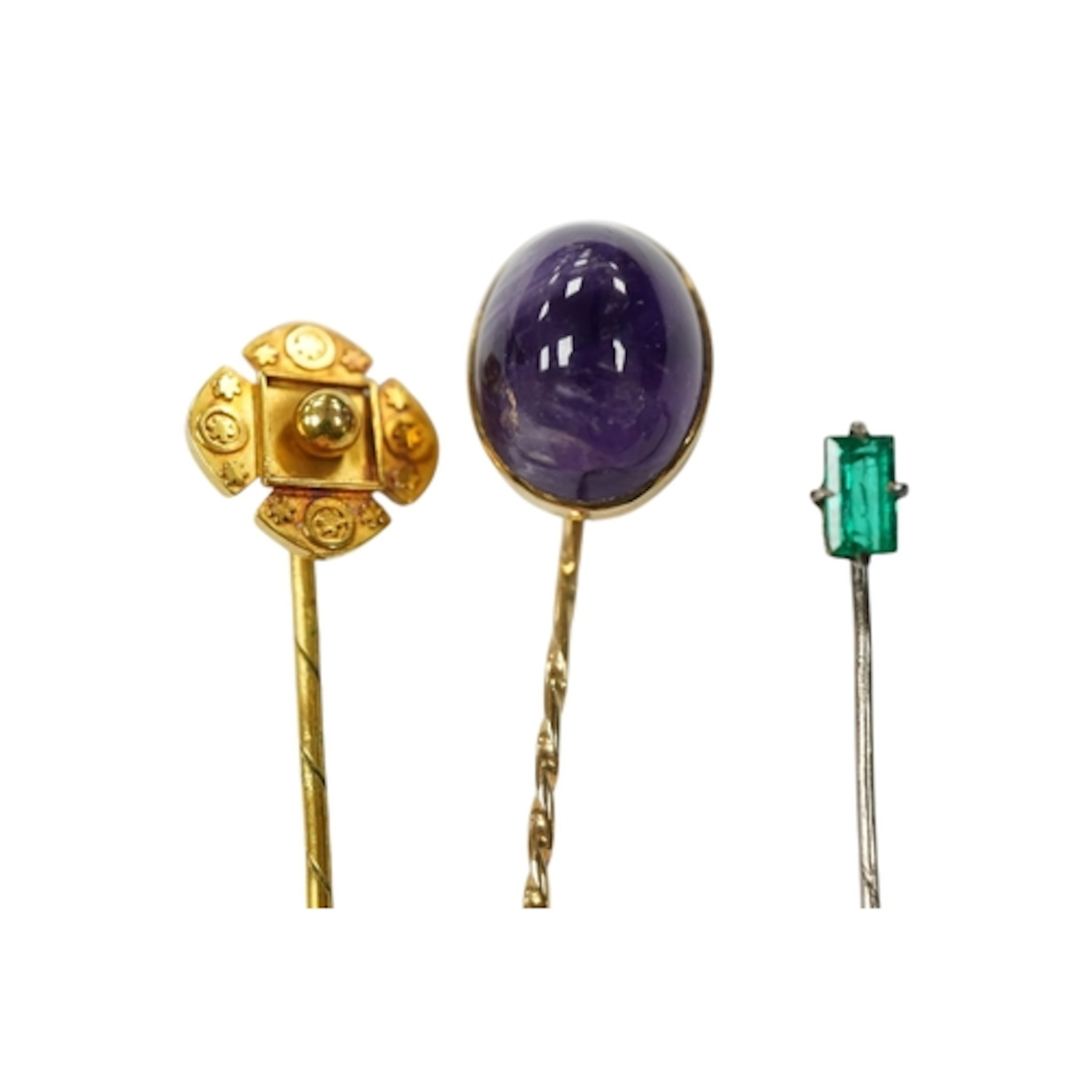 Three assorted late 19th/early 20th century stick pins, to i...