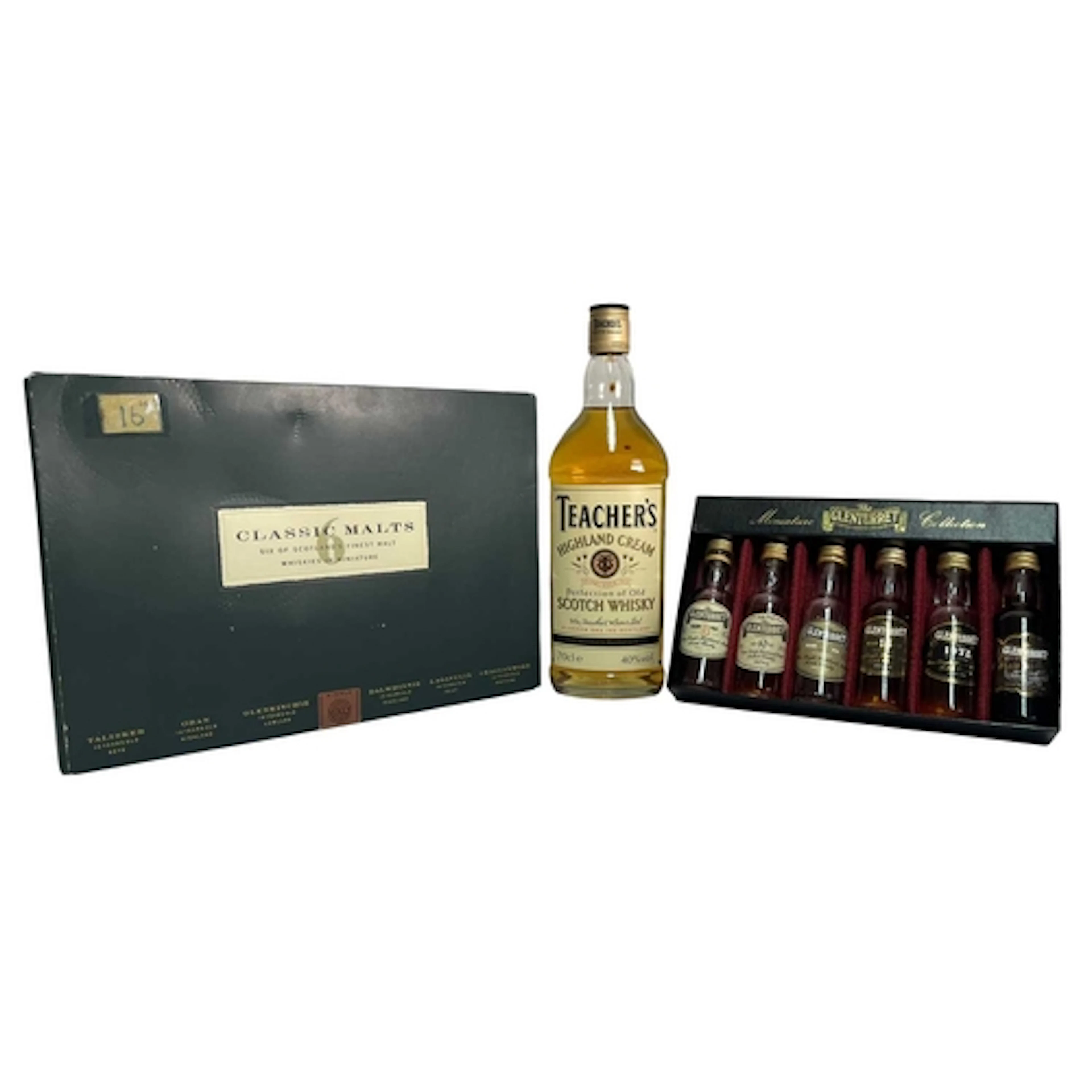 An assortment of Scotch Whisky bottle and miniatures. The lo...