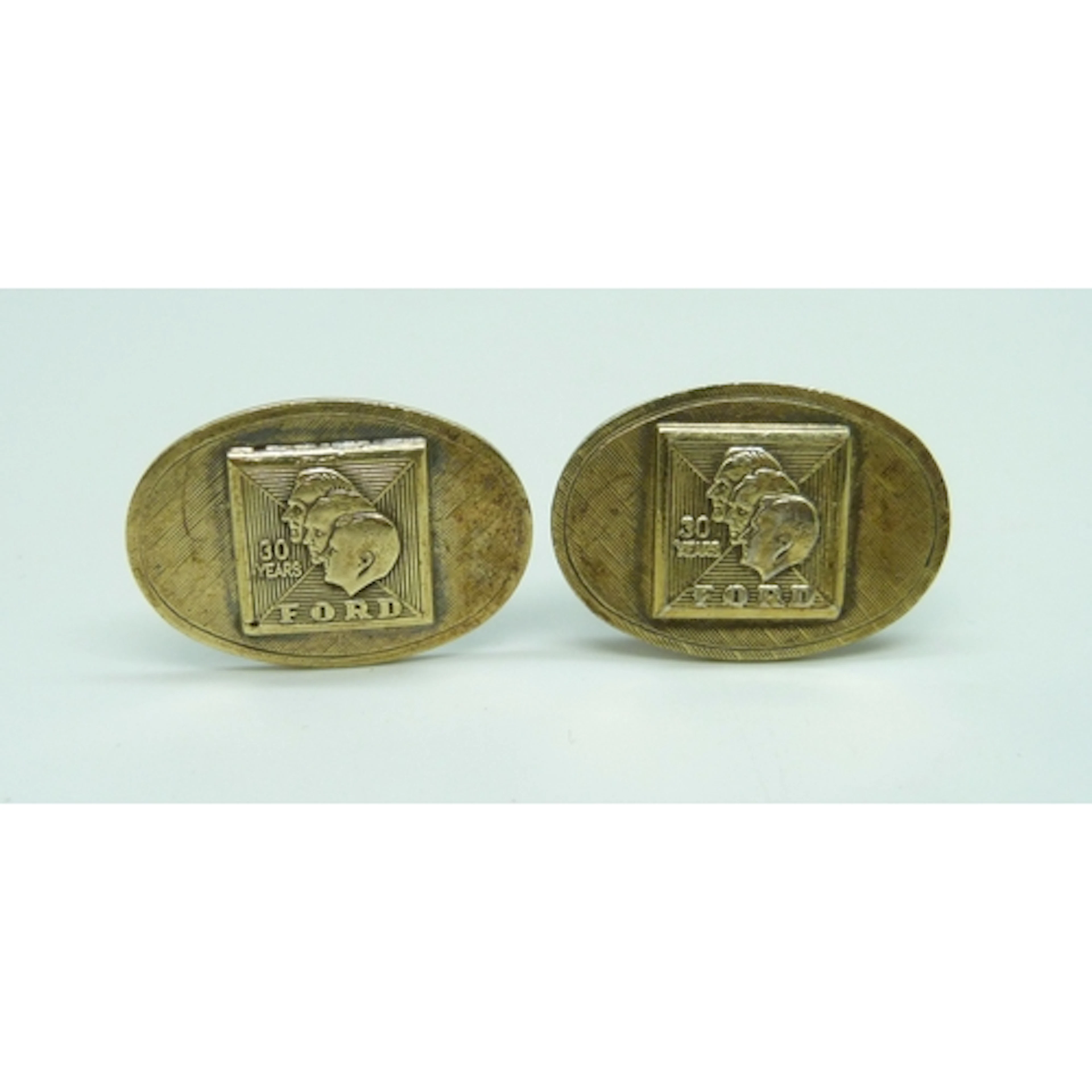 Automobilia interest, a pair of 1980s silver gilt Ford Cars ...