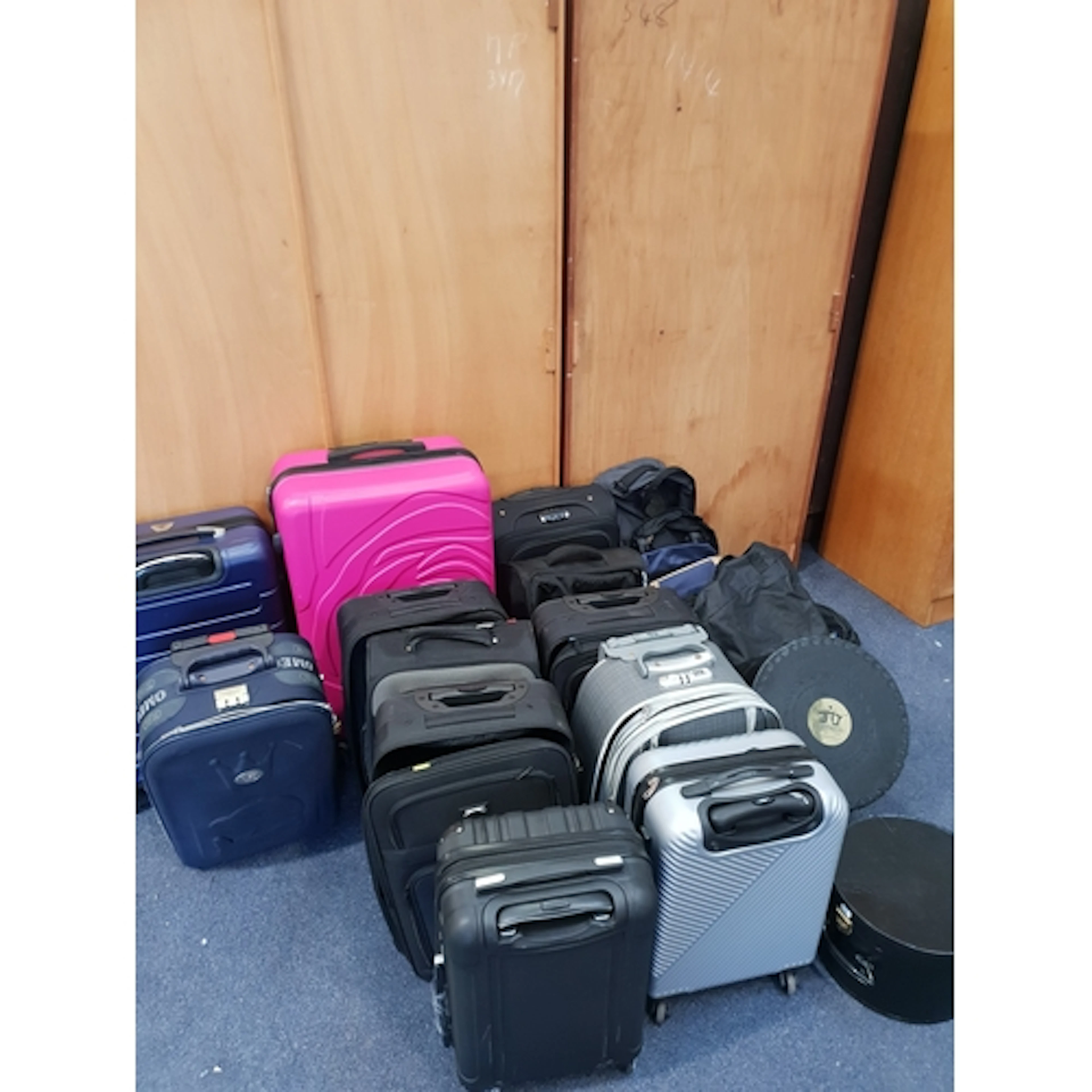 SELECTION OF TWELVE SUITCASES, TWO HAT CASES AND FOUR HOLDAL...