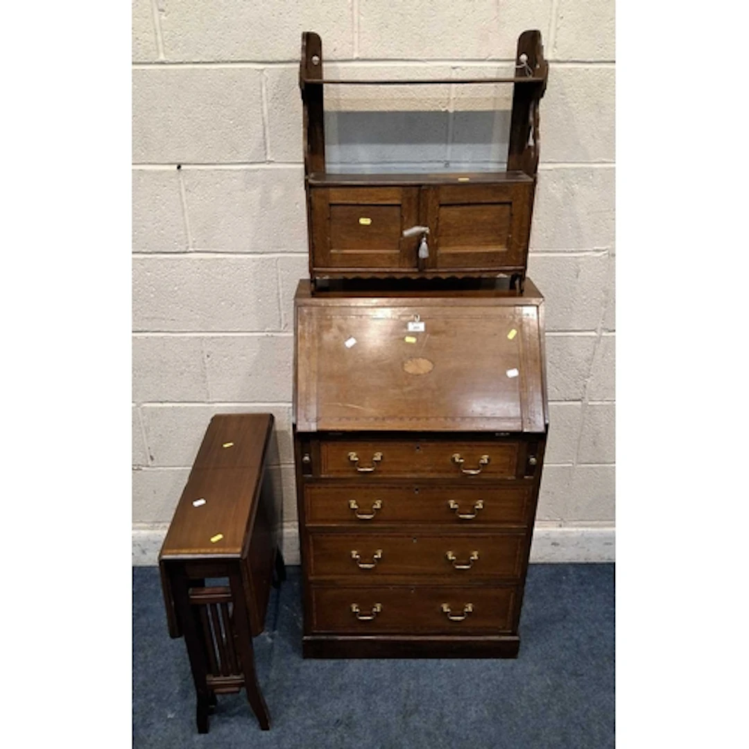 AN EDWARDIAN MAHOGANY BUREAU, the fall front door enclosing ...
