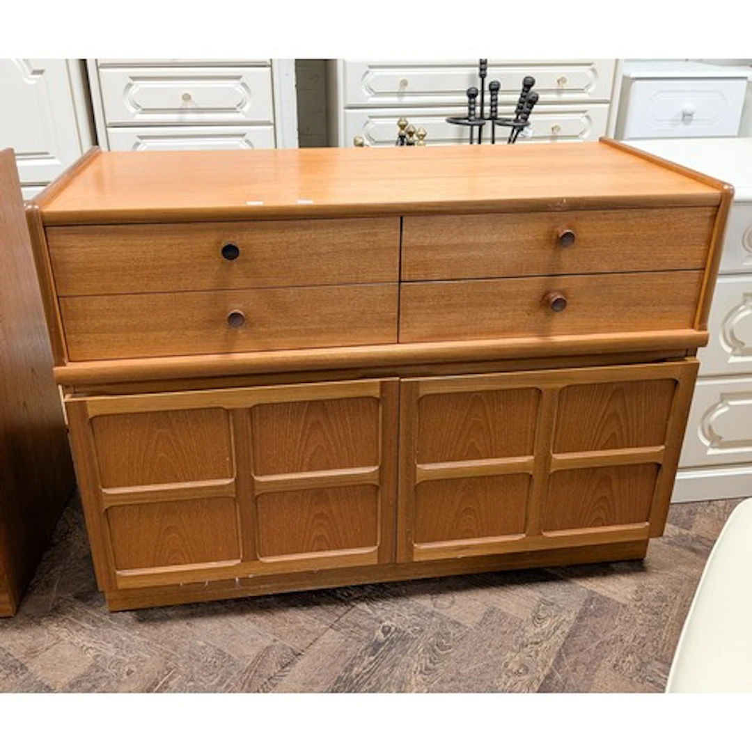 A 1980's Parker Knoll teak side cabinet fitted four drawers ...