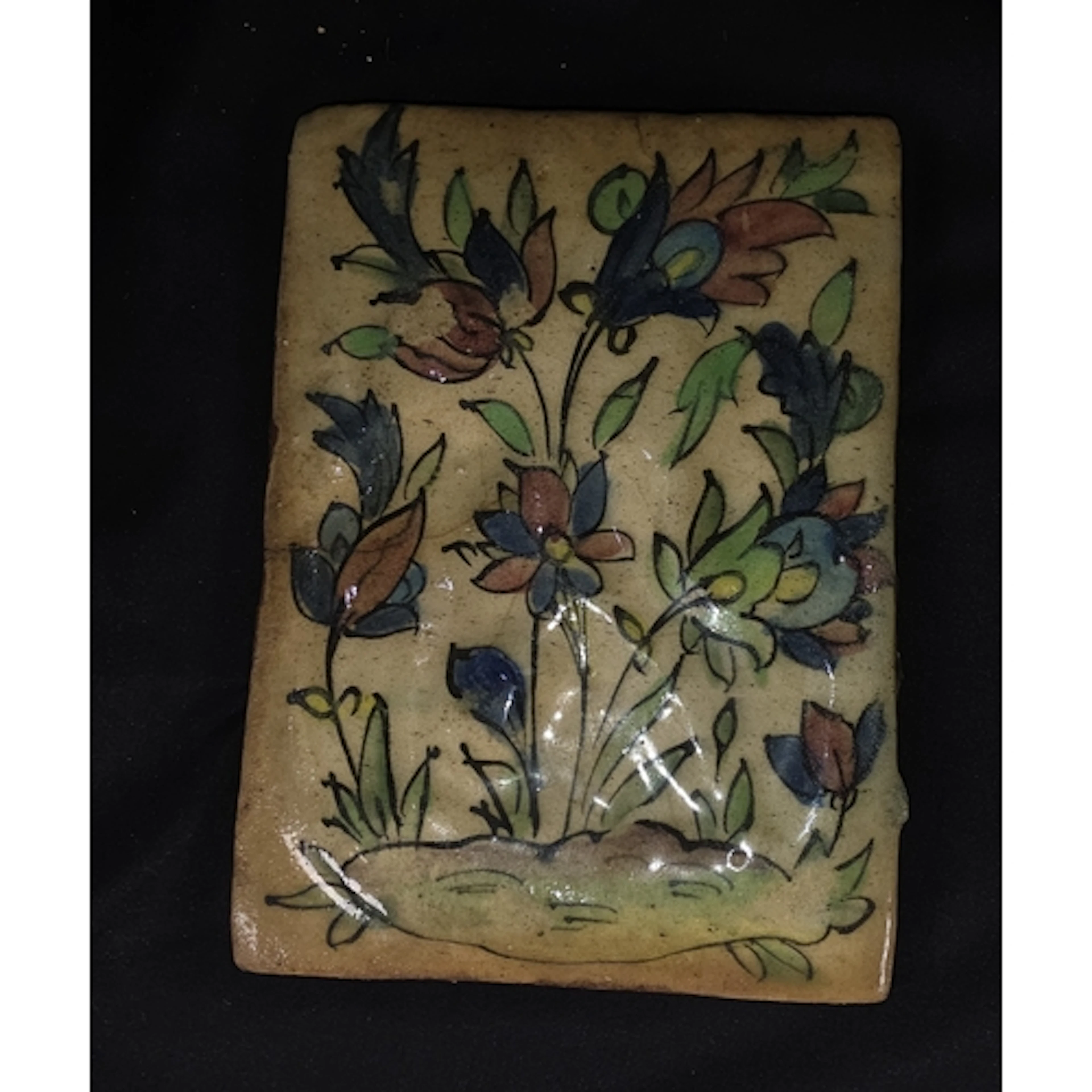 An 18th/19th century Persian design tile