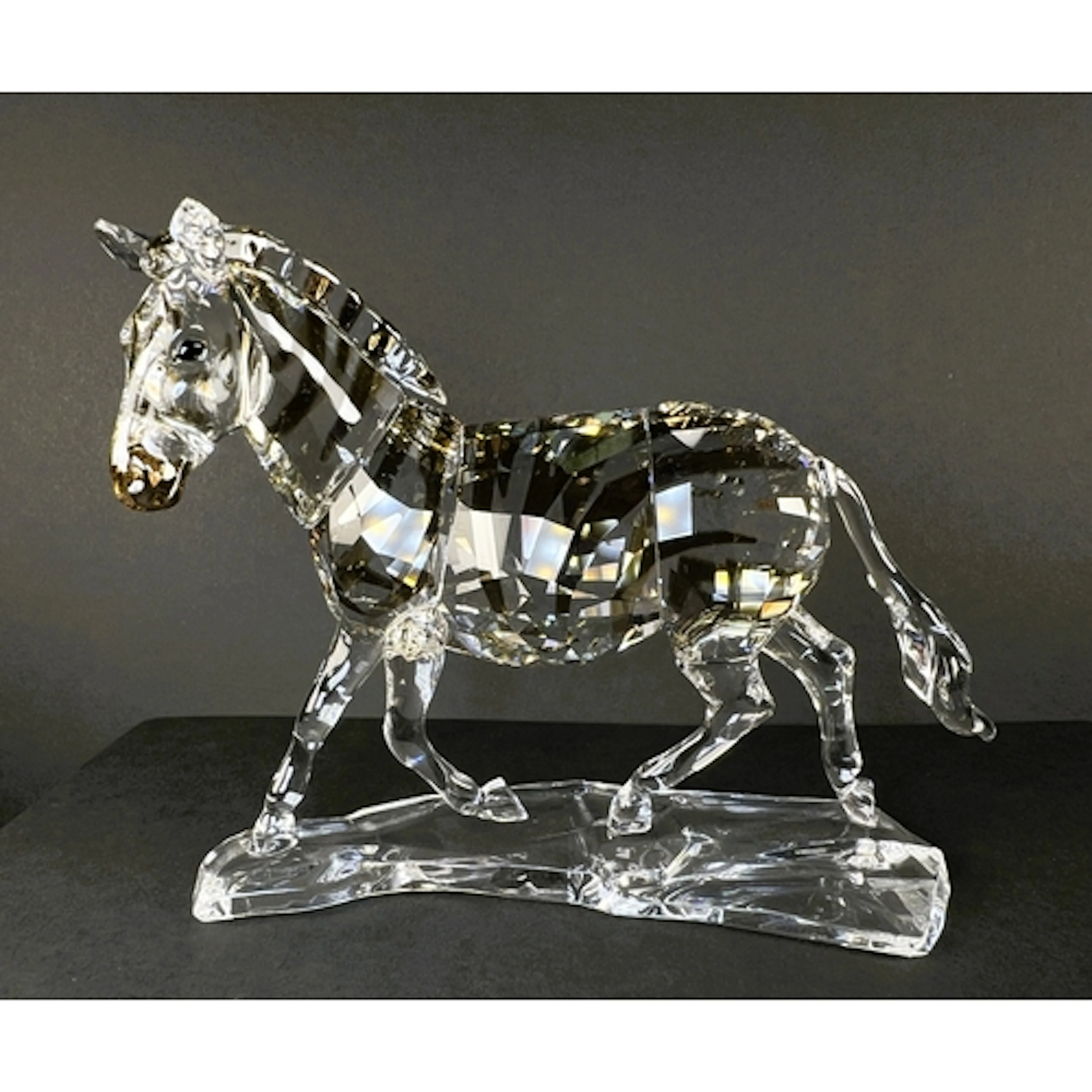A Swarovski Crystal zebra, no. 1050853, 12.5 x 10.5cm.